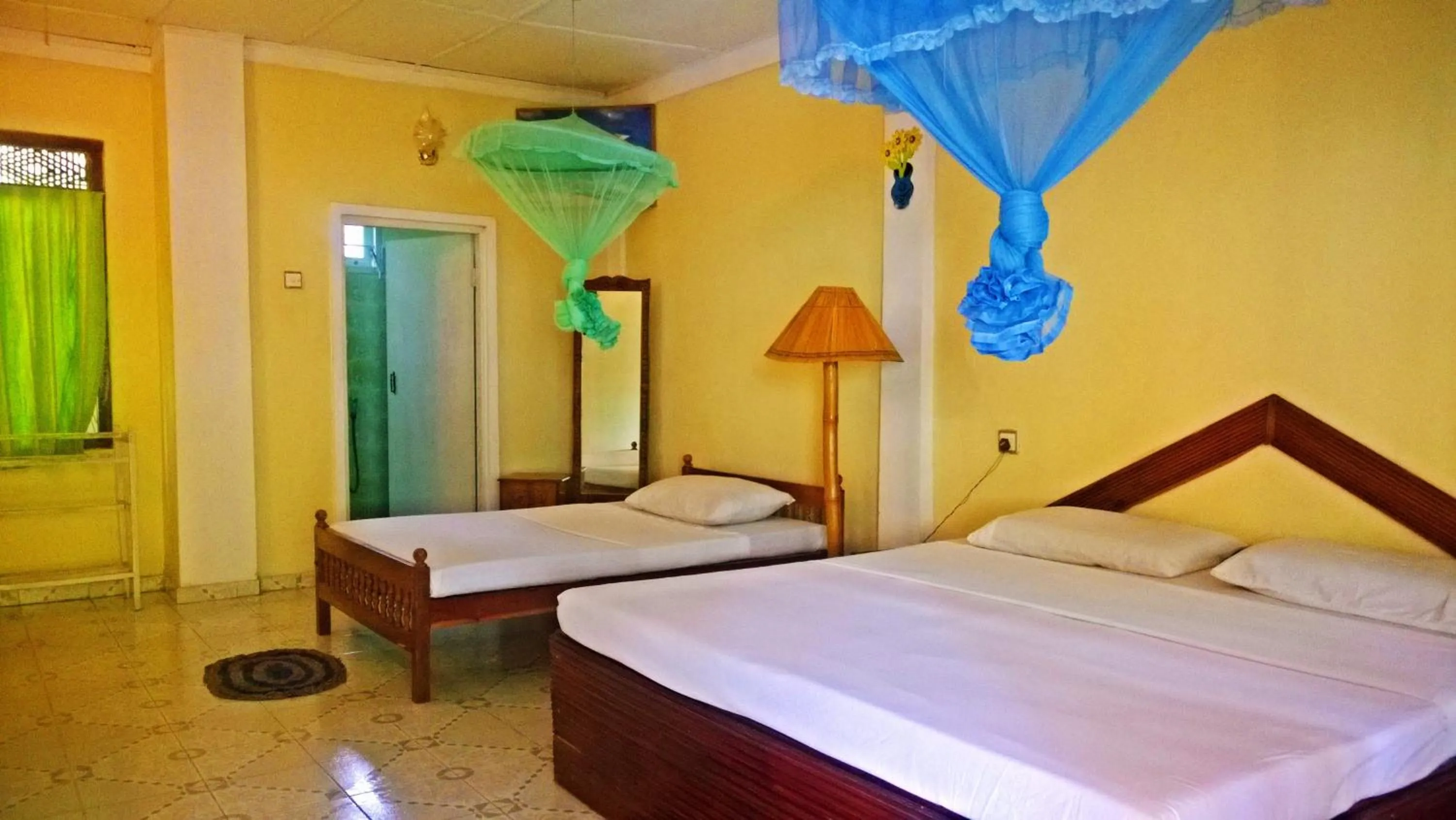 Bed in Sigiri Holiday Inn