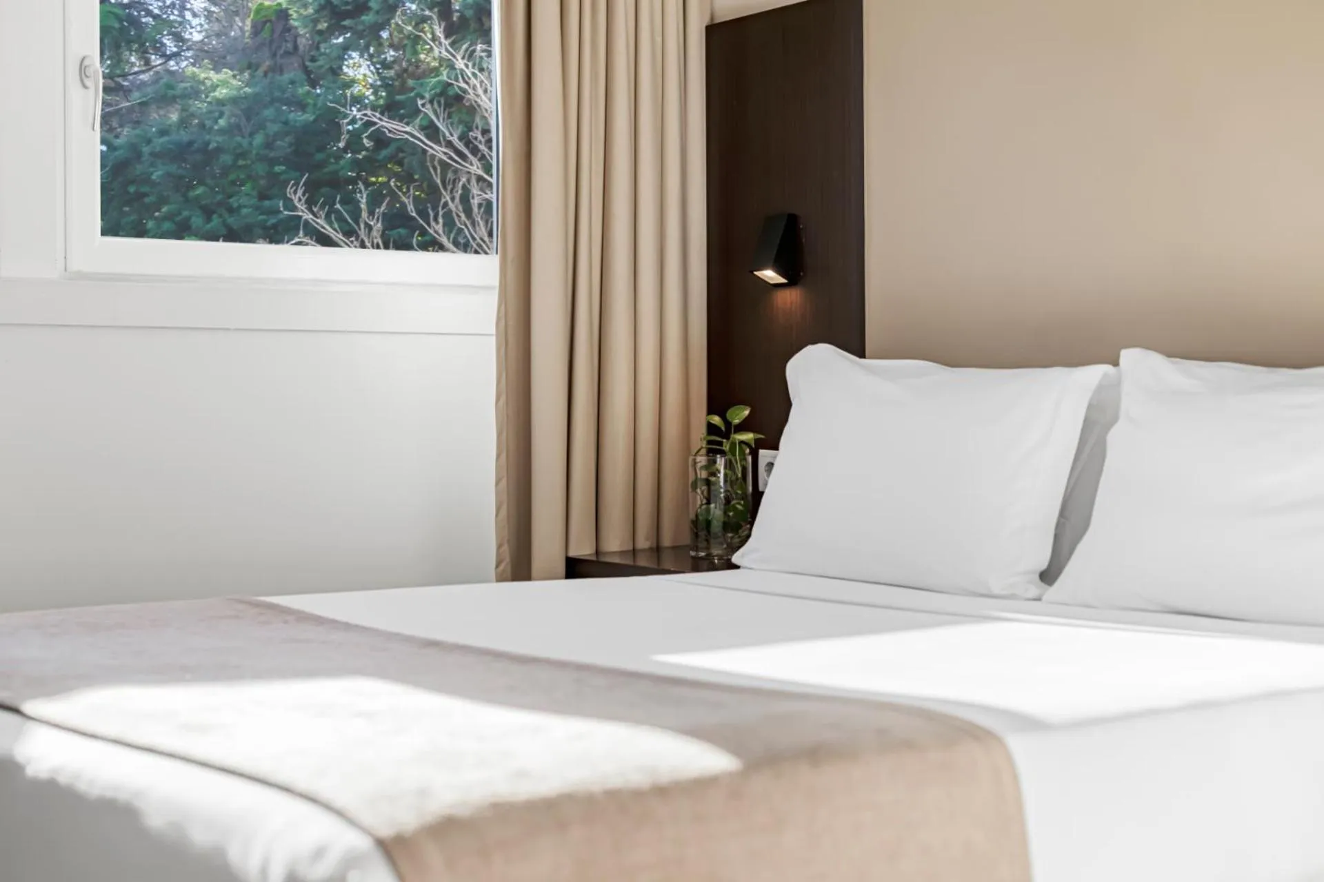 Bed in Lisboa Central Park Hotel Suites & Studios