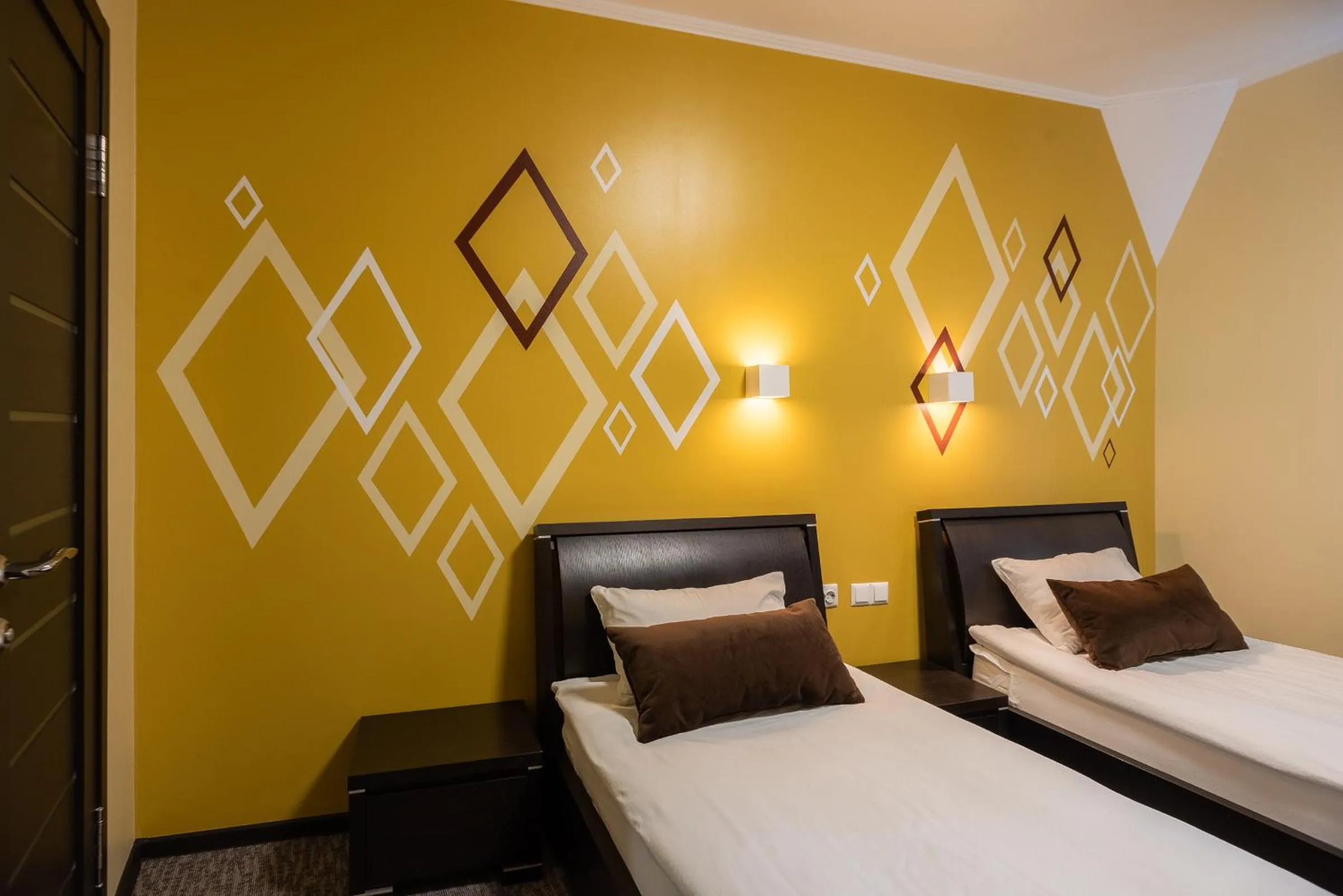 Twin Room with Balcony - single occupancy in Rhombus Hotel