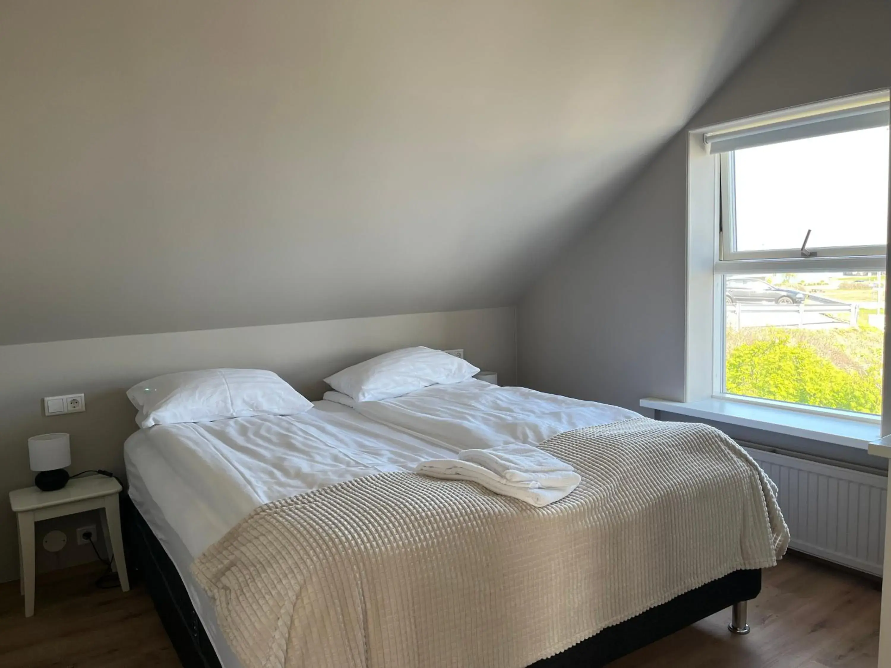 Bed in Hvammur Apartments by the Harbour Bed in Hvammur Apartments by the Harbour