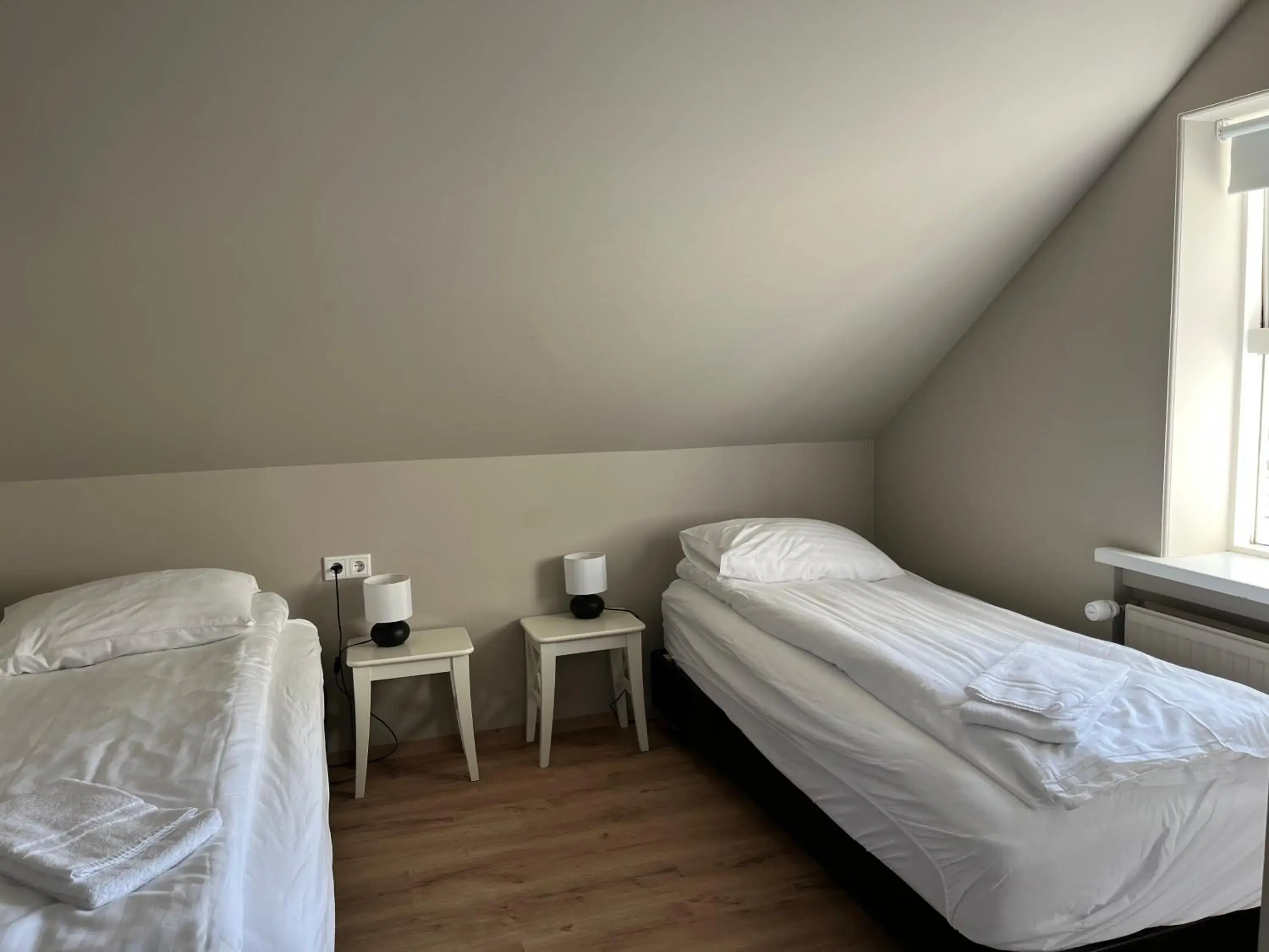 Bed in Hvammur Apartments by the Harbour Bed in Hvammur Apartments by the Harbour