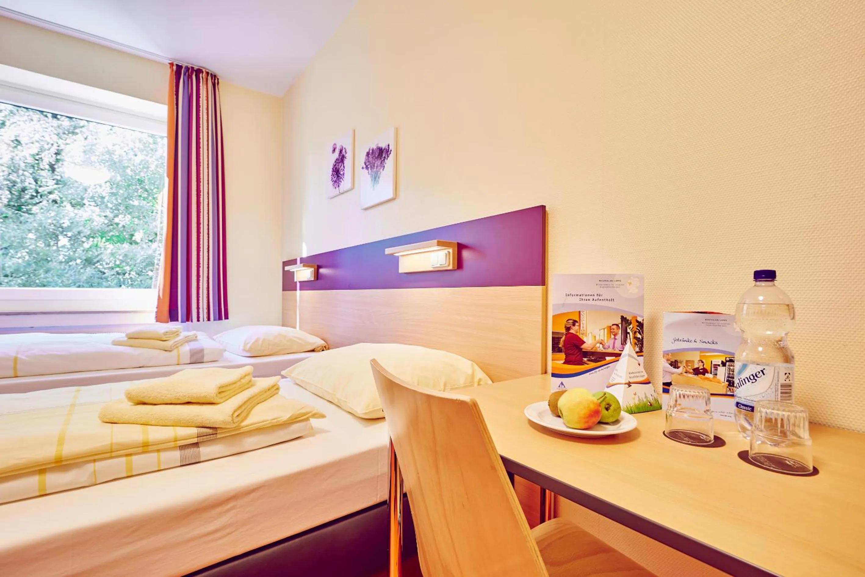 Seating area, Bed in DJH Jugendherberge Hagen