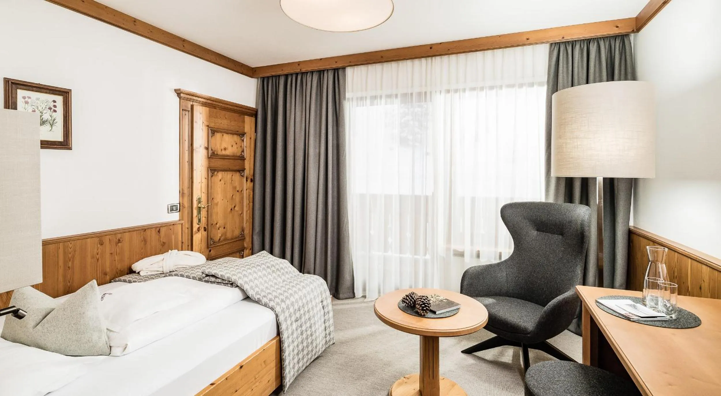 Photo of the whole room, Bed in Savoy Dolomites Luxury & Spa Hotel