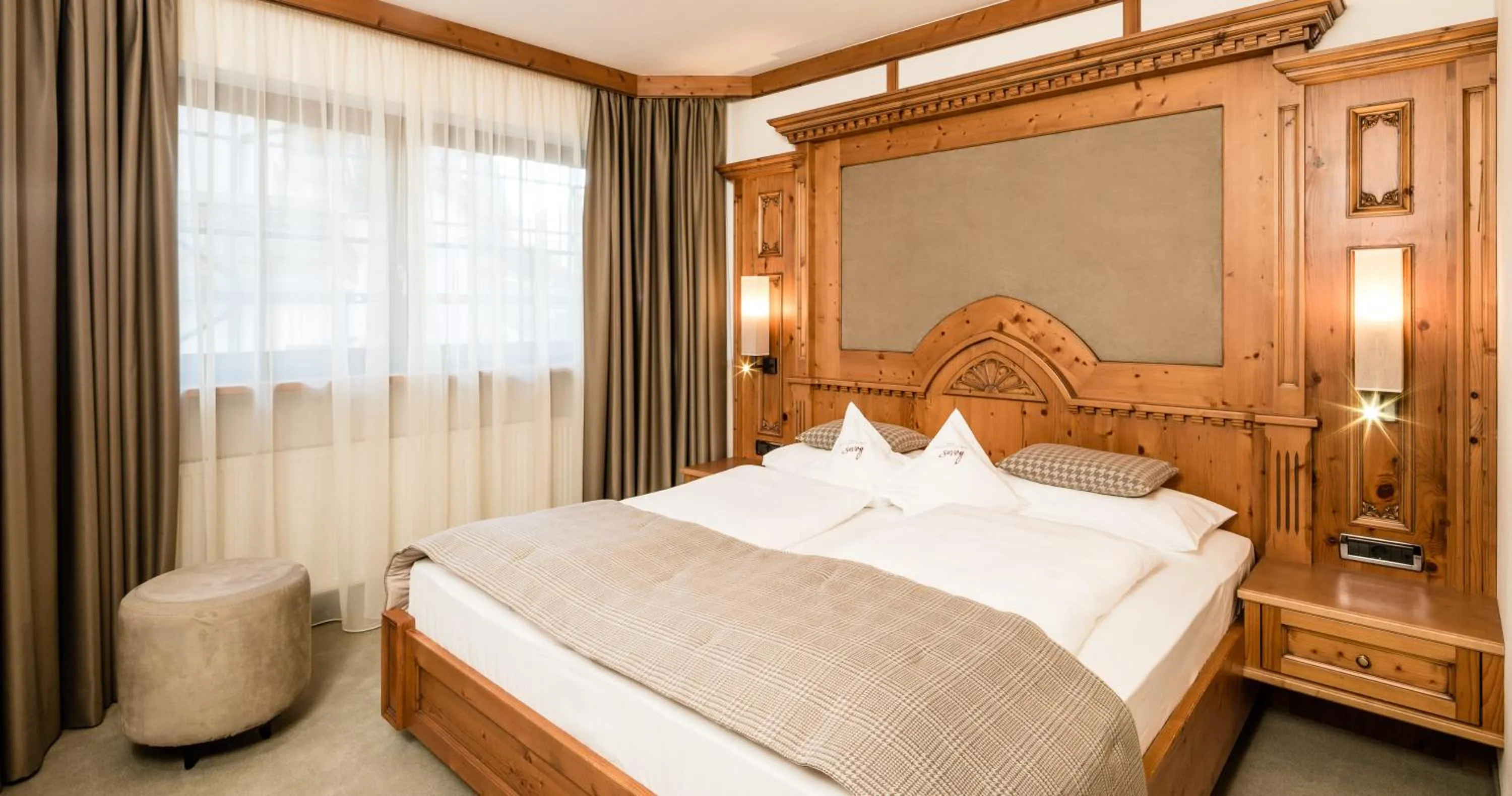 Bed in Savoy Dolomites Luxury & Spa Hotel