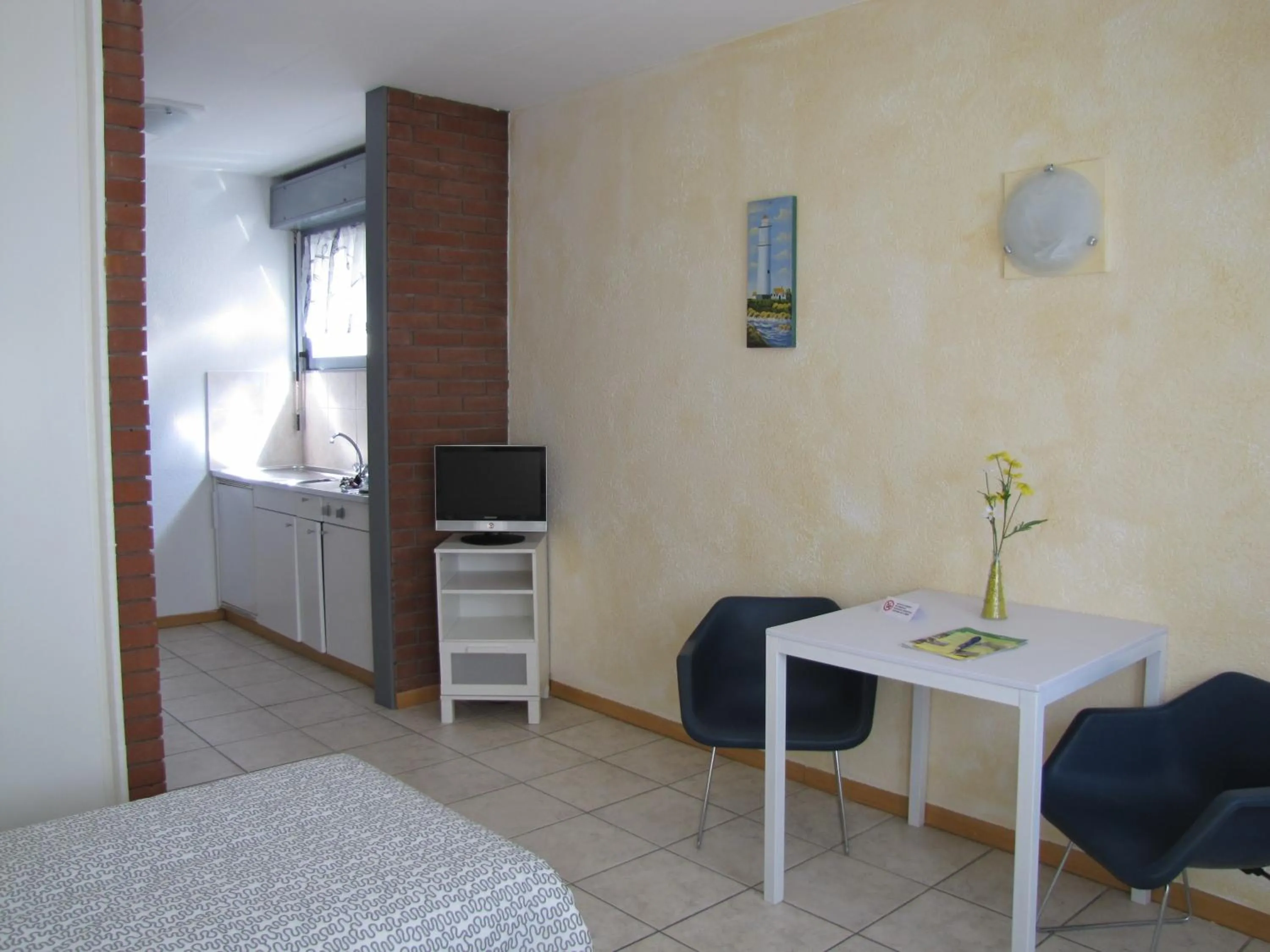 Seating area, Bed in Residence Tell