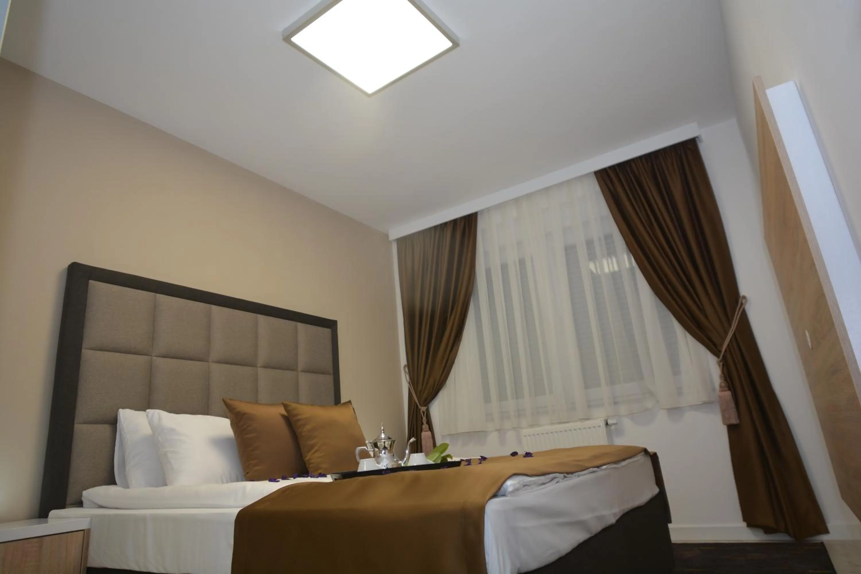 Bed in Apart Hotel Family