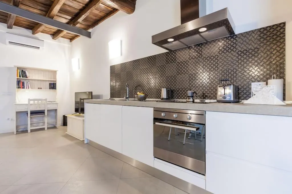 Kitchen or kitchenette in Maison Romana Loft