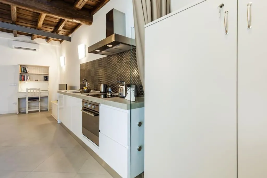 Kitchen or kitchenette in Maison Romana Loft