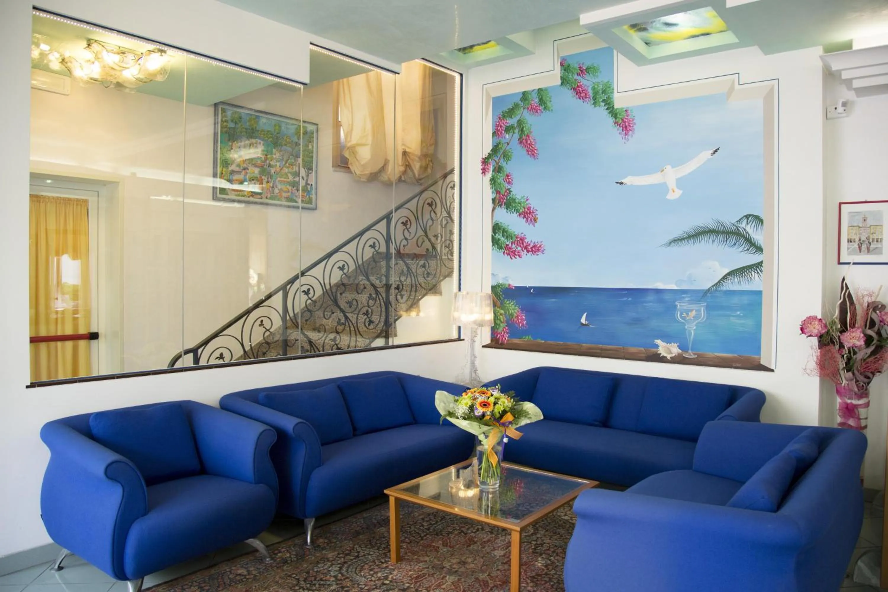 Communal lounge/ TV room in Hotel Ancora