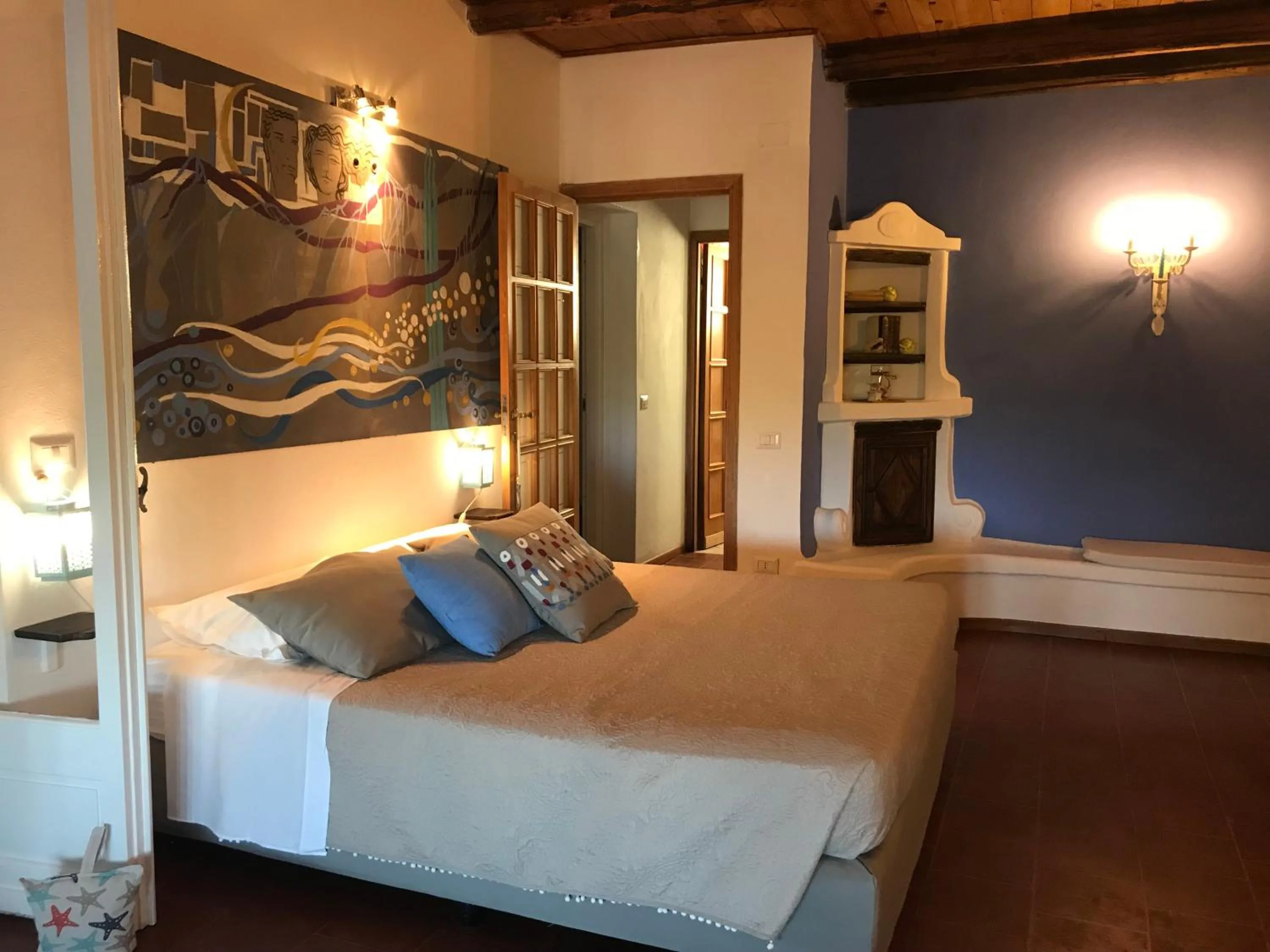 Bed in Palmasera Charming Suites