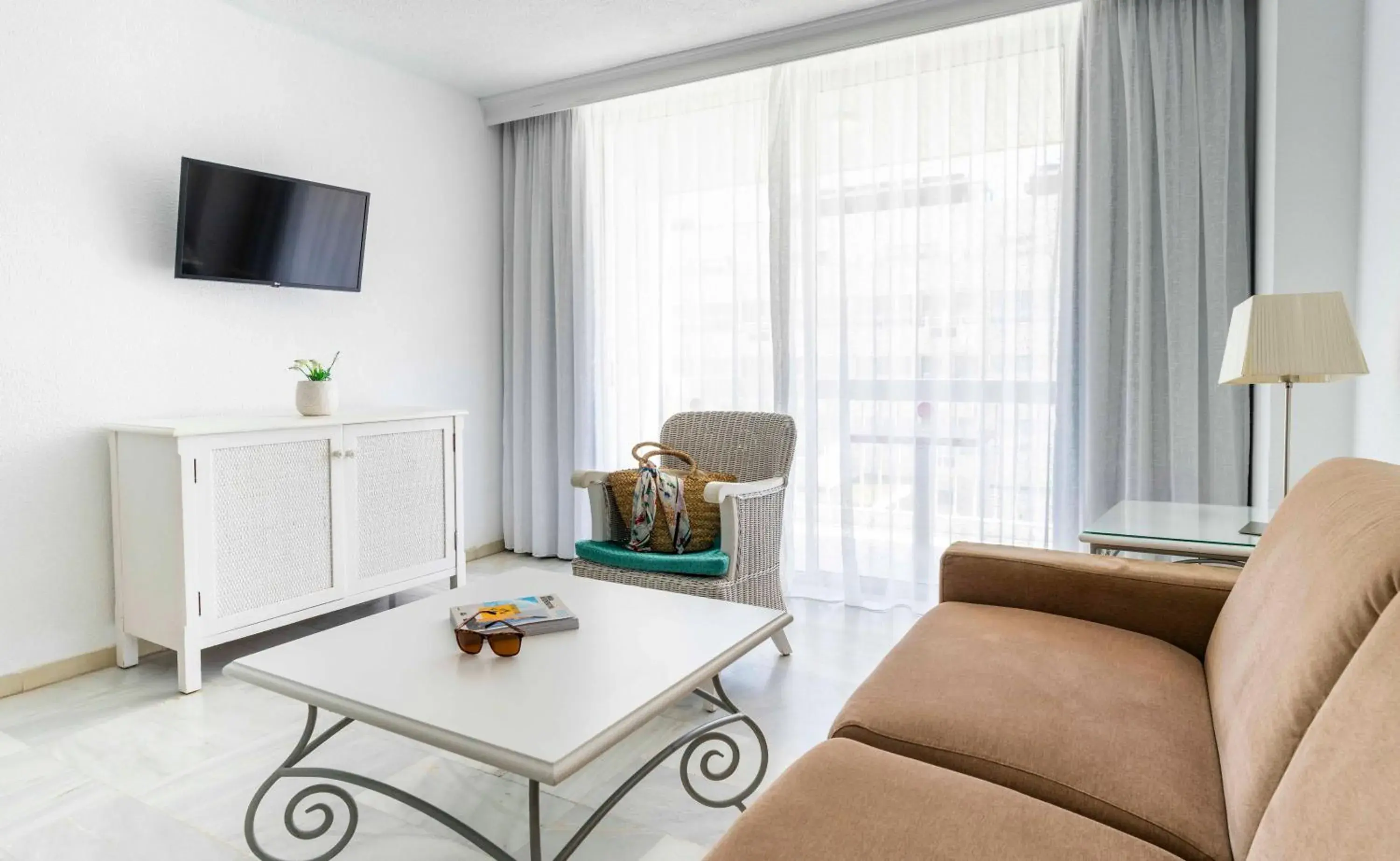 Living room in Palm Beach - Excel Hotels & Resorts Living room in Palm Beach - Excel Hotels & Resorts