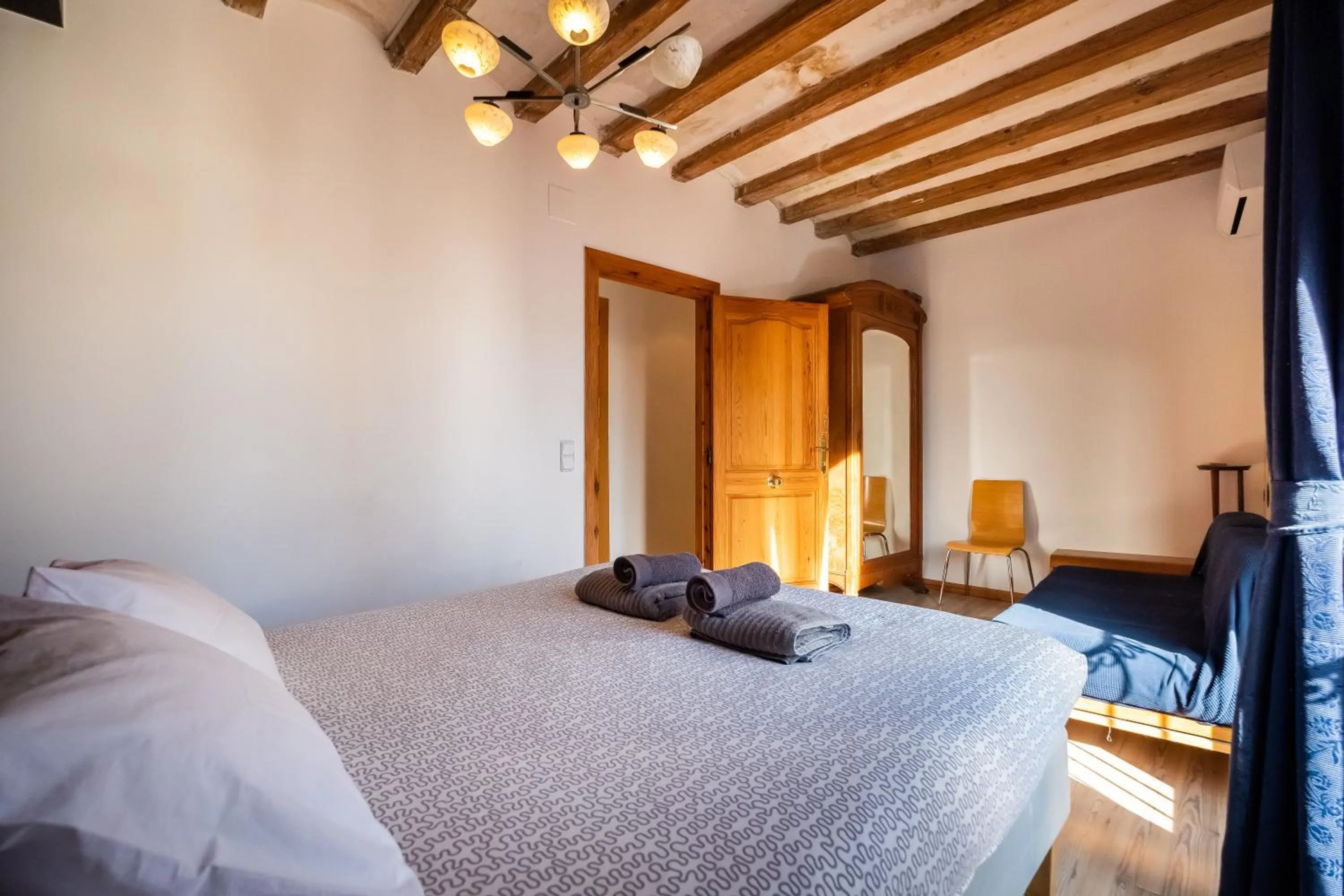 Bed in Apartamentos El Pintor