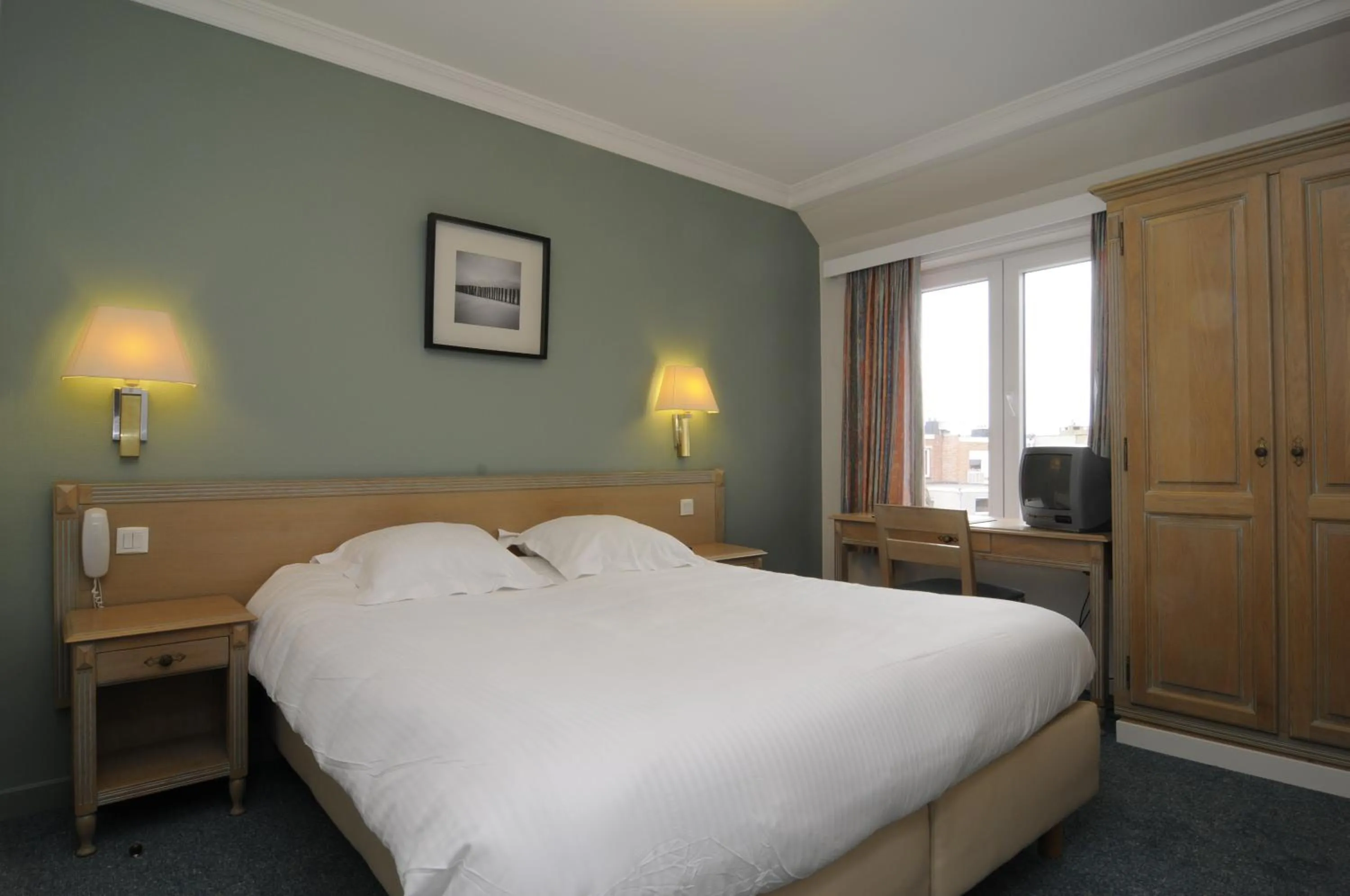 Bed in Hotel Sabot D'Or