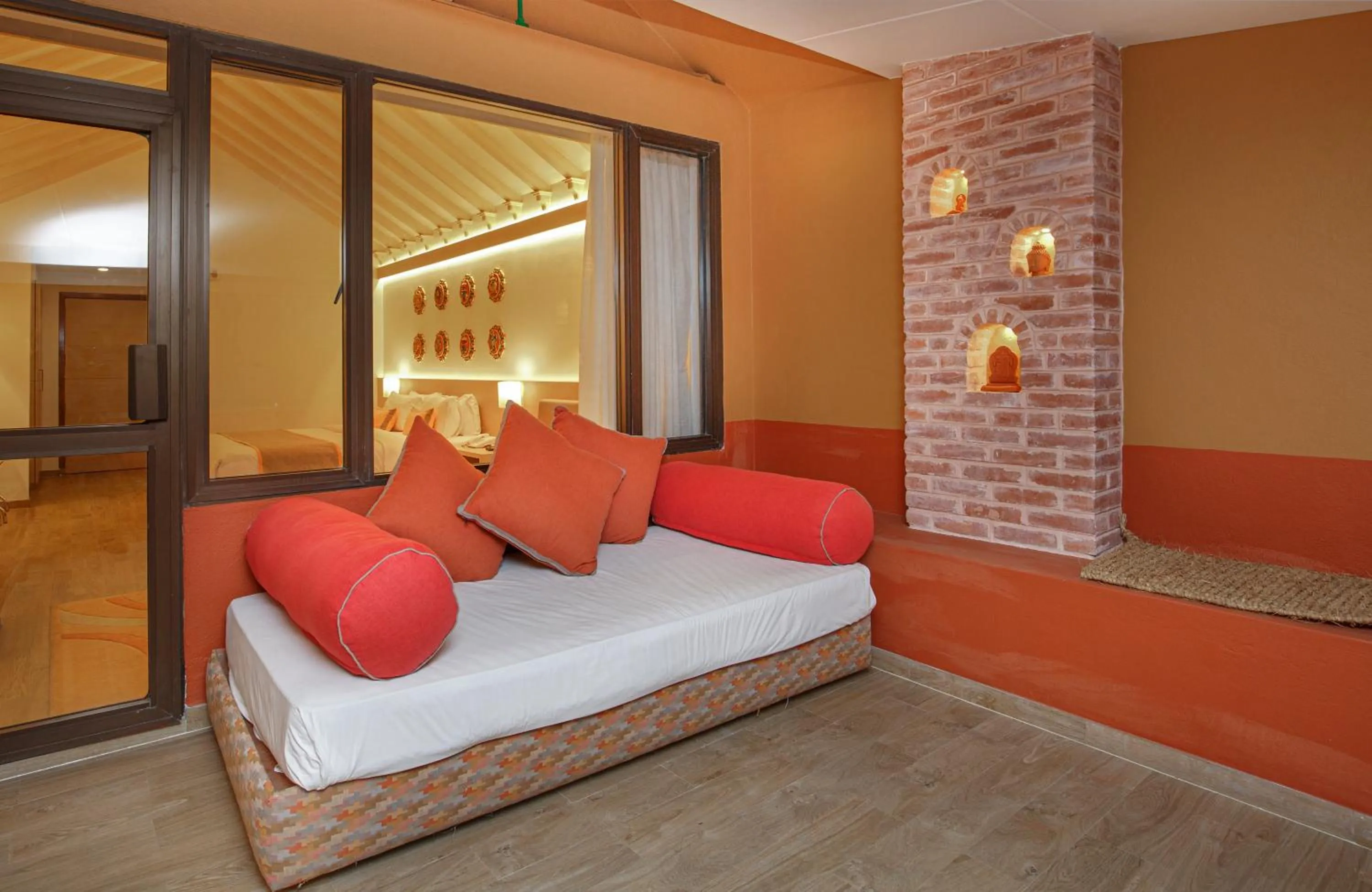 Seating area, Bed in Club Himalaya, by ACE Hotels