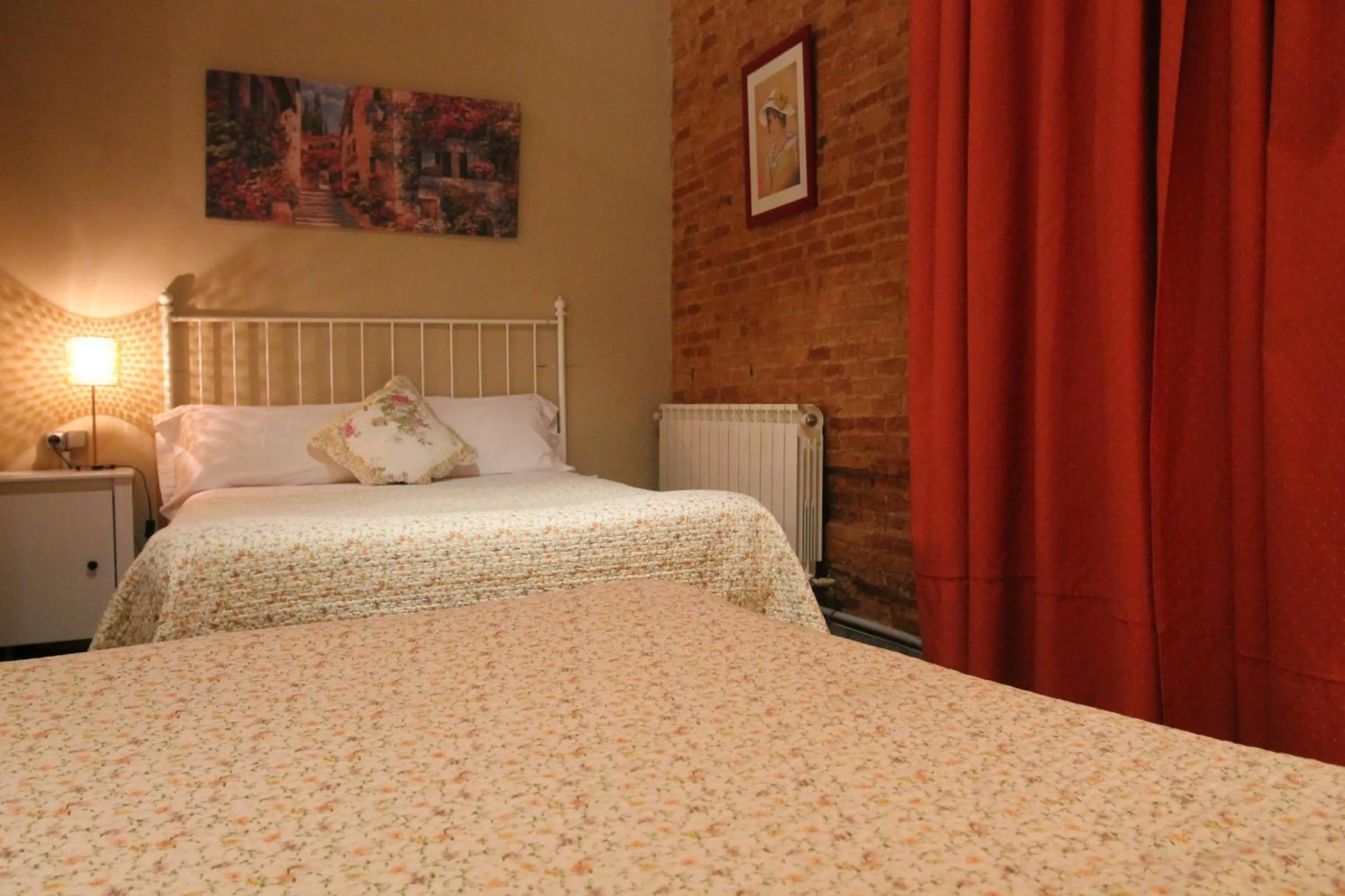 Photo of the whole room, Bed in Hostal Orleans