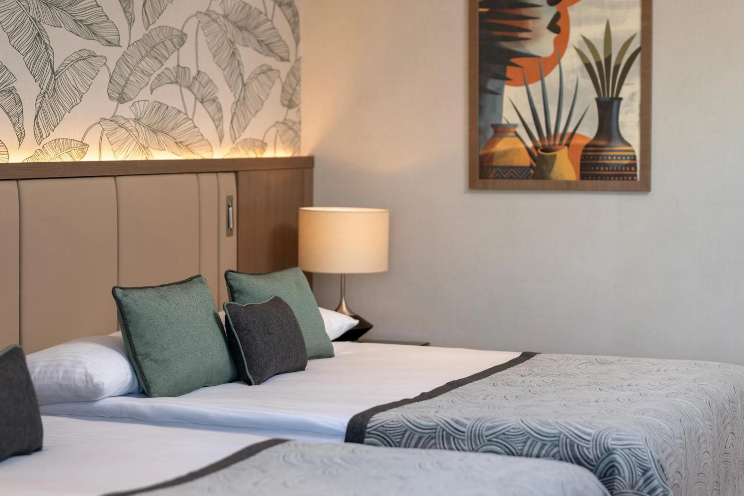 Bed in Miracle Resort Hotel