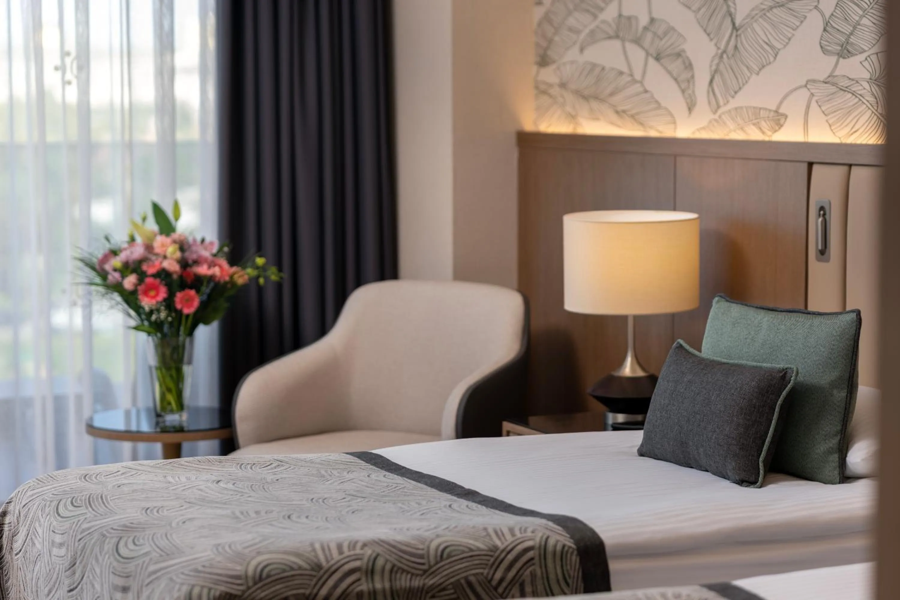 Bed in Miracle Resort Hotel