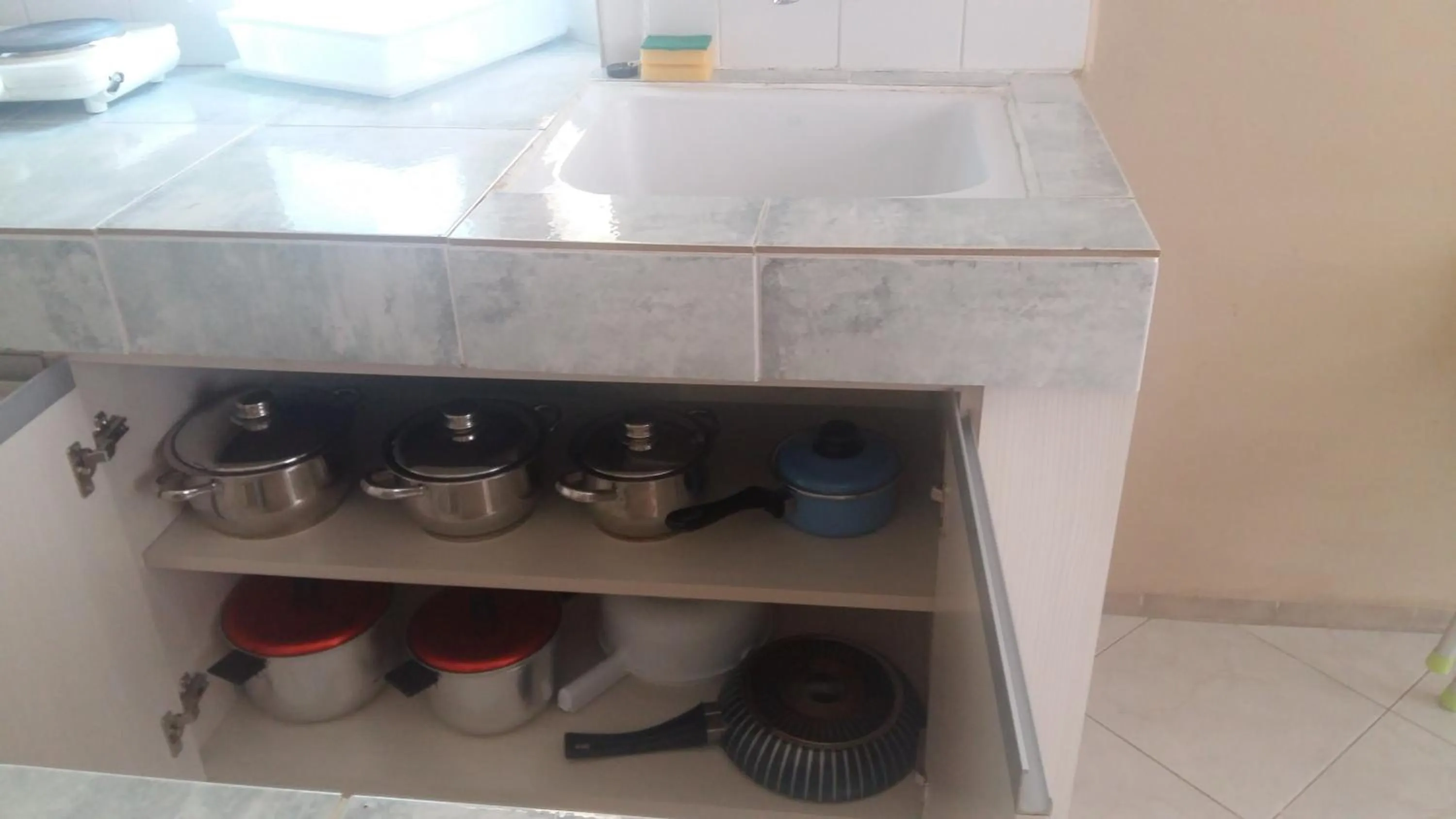 Kitchen or kitchenette in Musti Apart Hotel