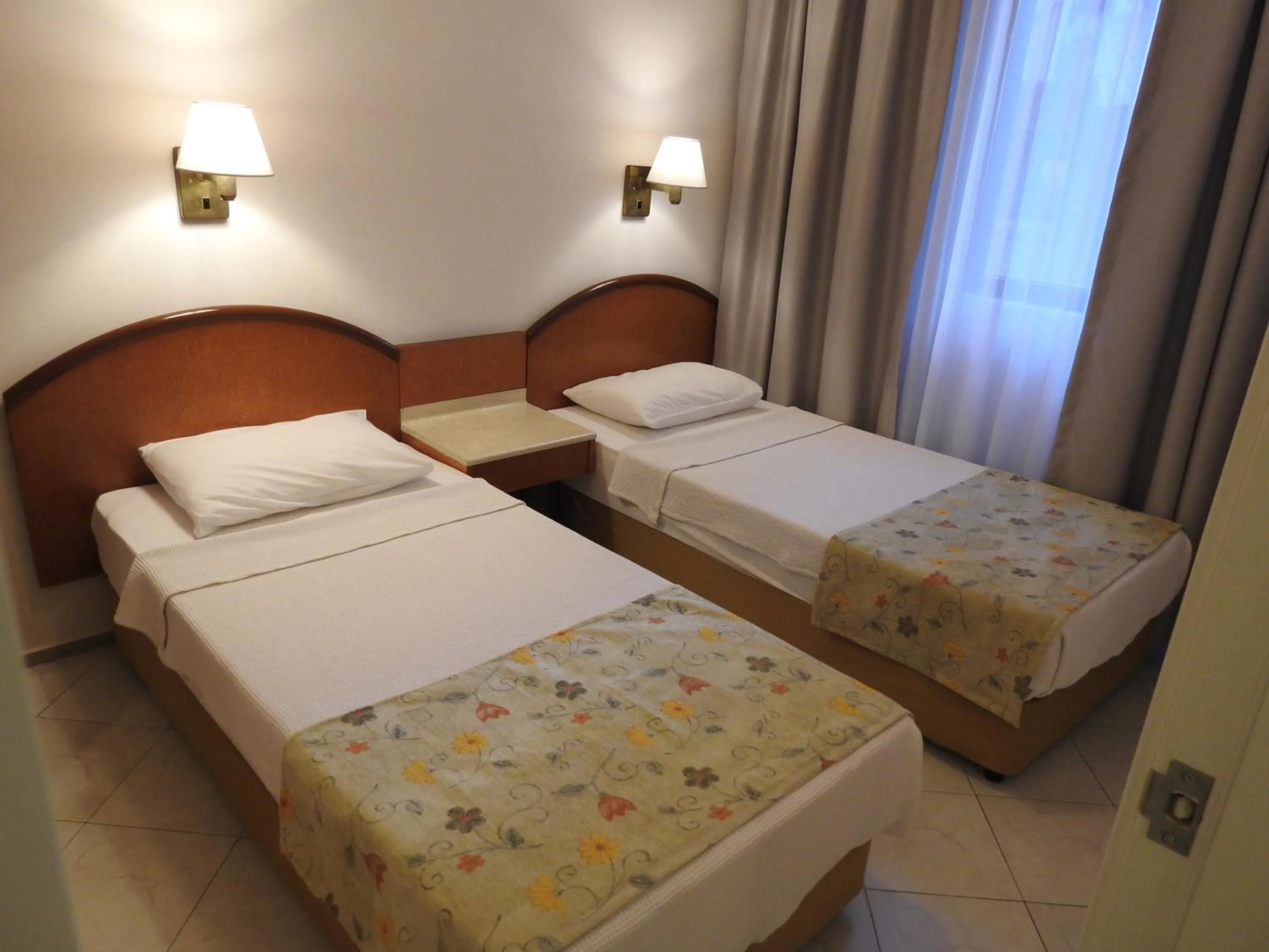Bed in Musti Apart Hotel