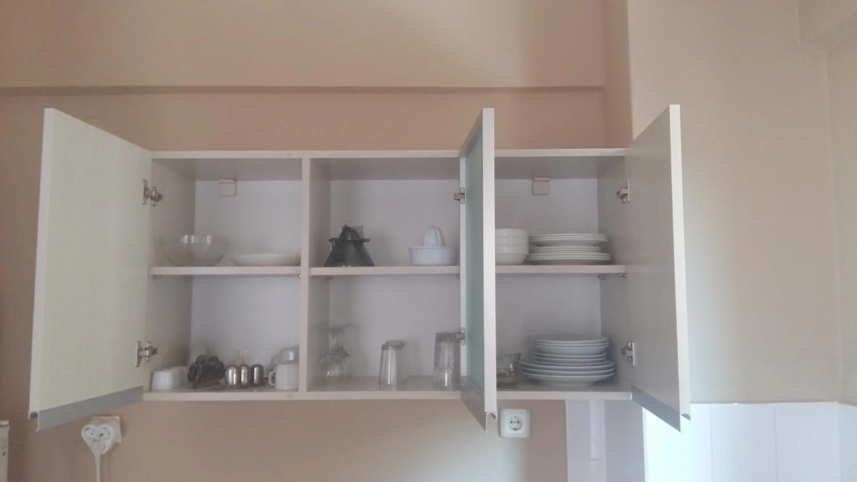 Kitchen or kitchenette in Musti Apart Hotel