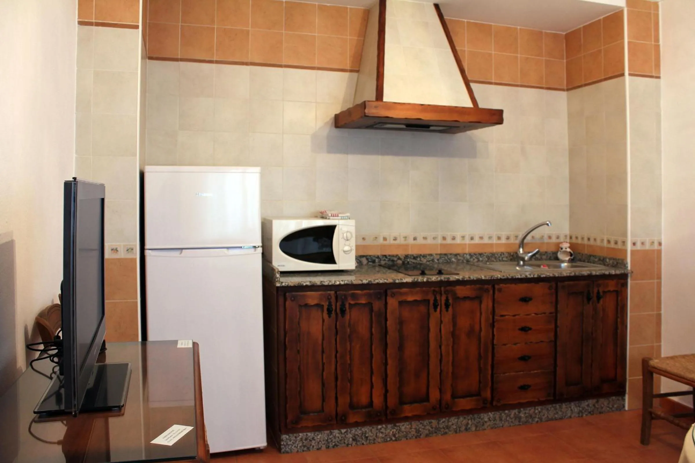 Kitchen or kitchenette in Apartamentos Casa Gil