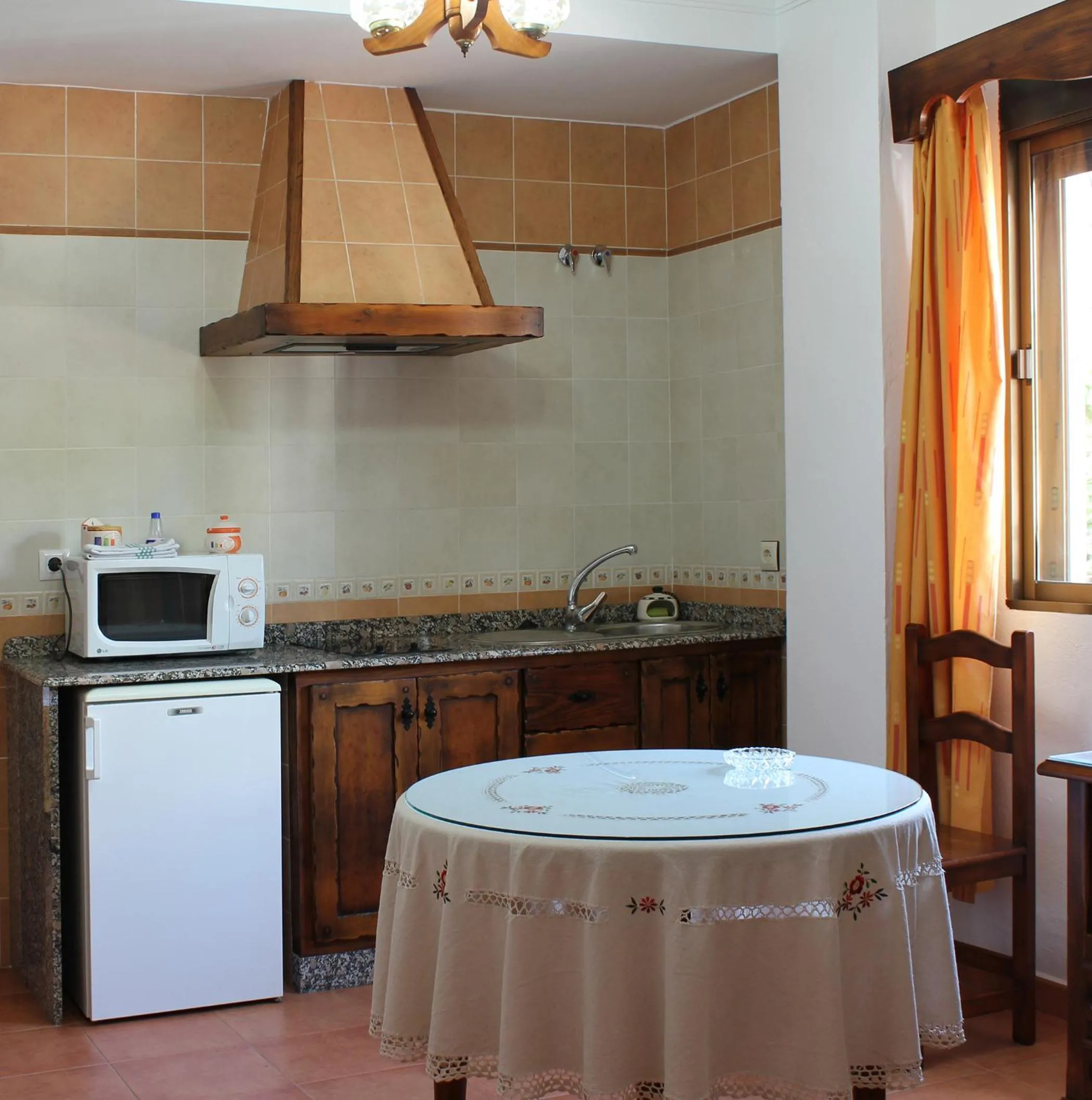 Kitchen or kitchenette in Apartamentos Casa Gil