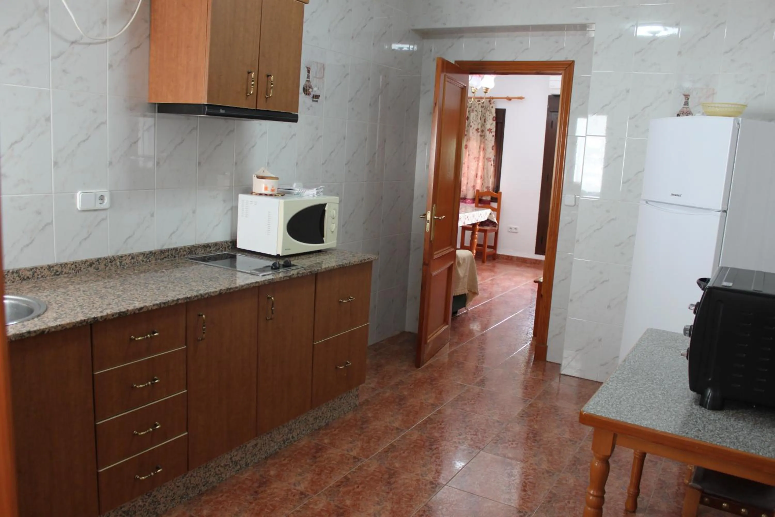 Kitchen or kitchenette in Apartamentos Casa Gil