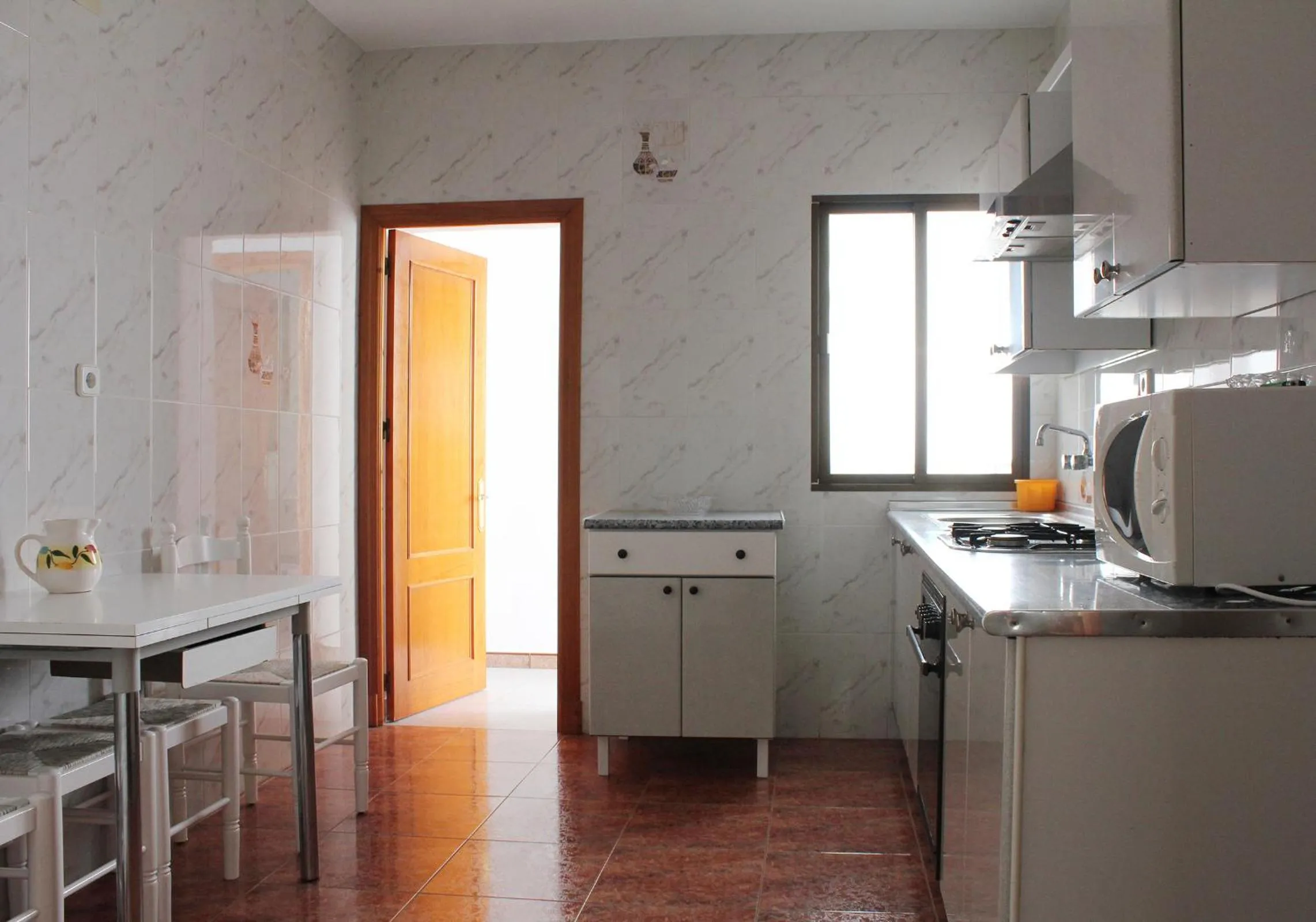 Kitchen or kitchenette in Apartamentos Casa Gil