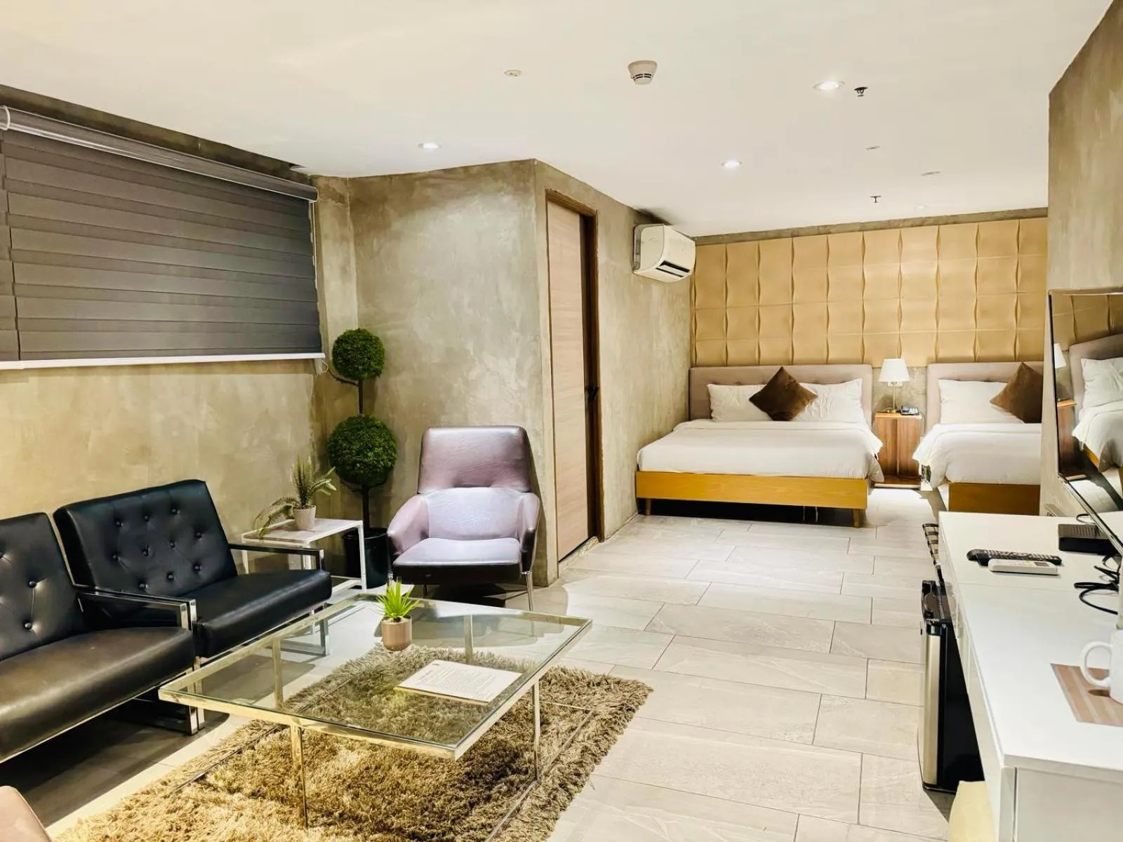 Bed in City Park Hotel Residences