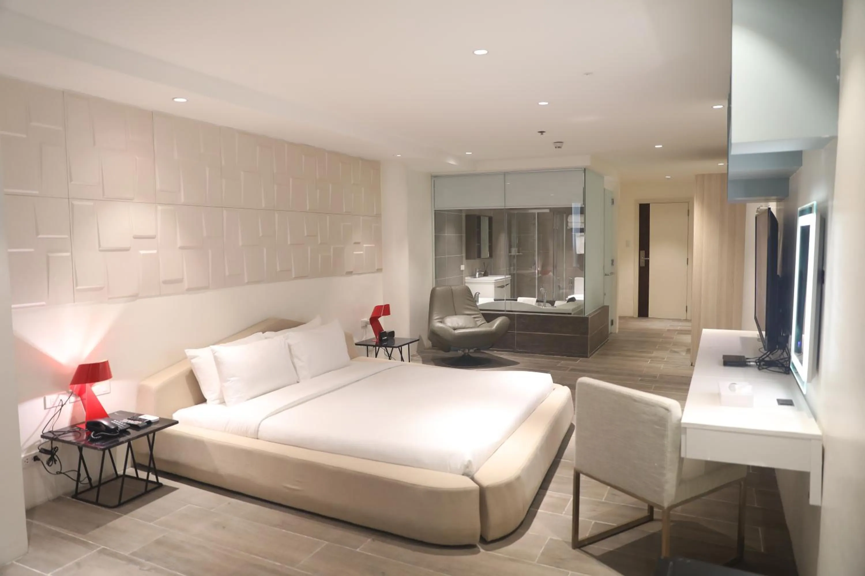 Bed in City Park Hotel Residences