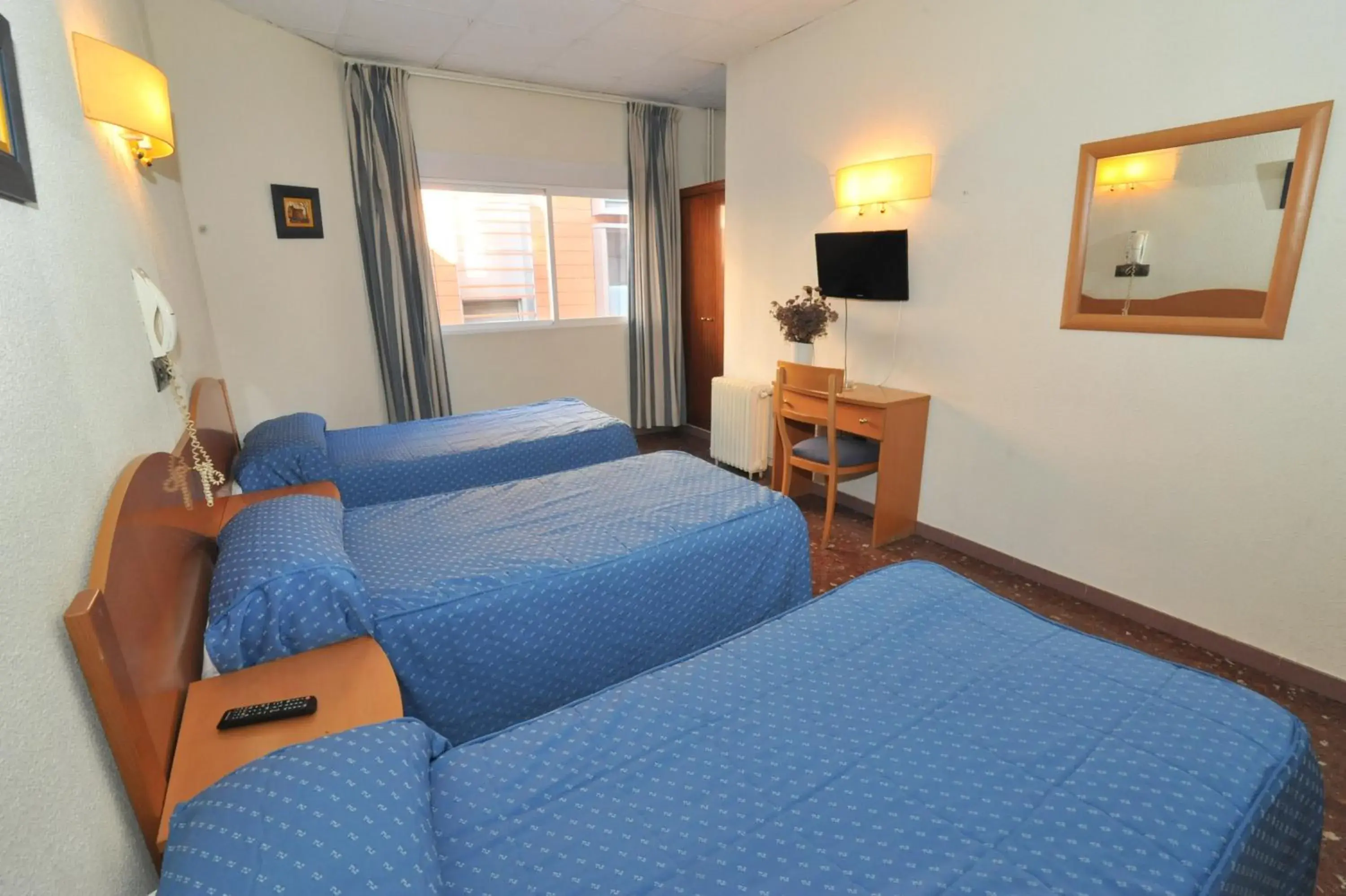 Triple Room in Hostal Goyma I Triple Room in Hostal Goyma I