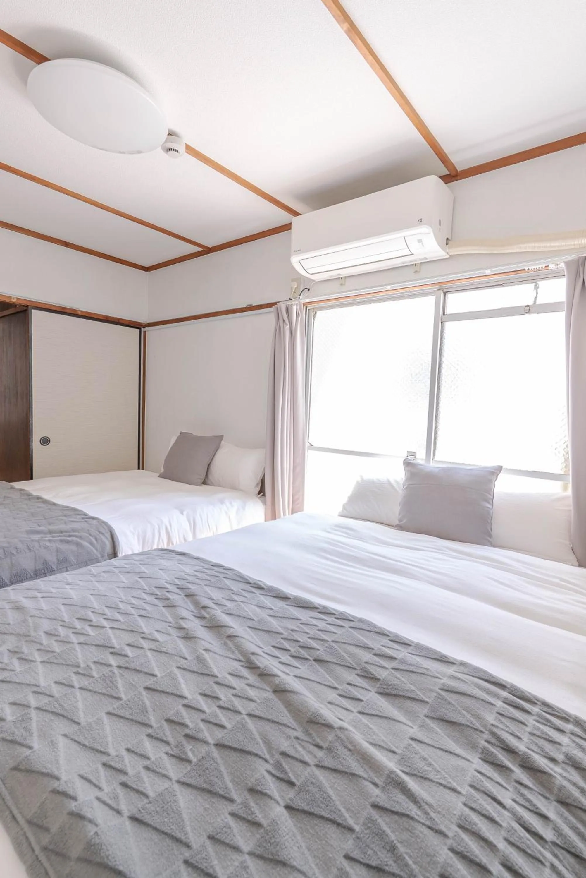 Bedroom, Bed in Hakata apartment