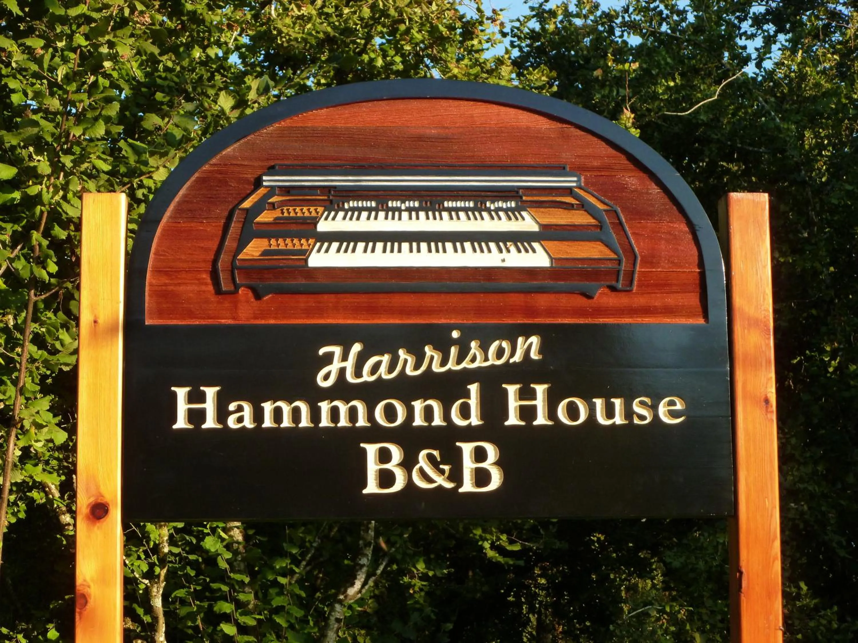 Property logo or sign in Harrison Hammond House Farmstay