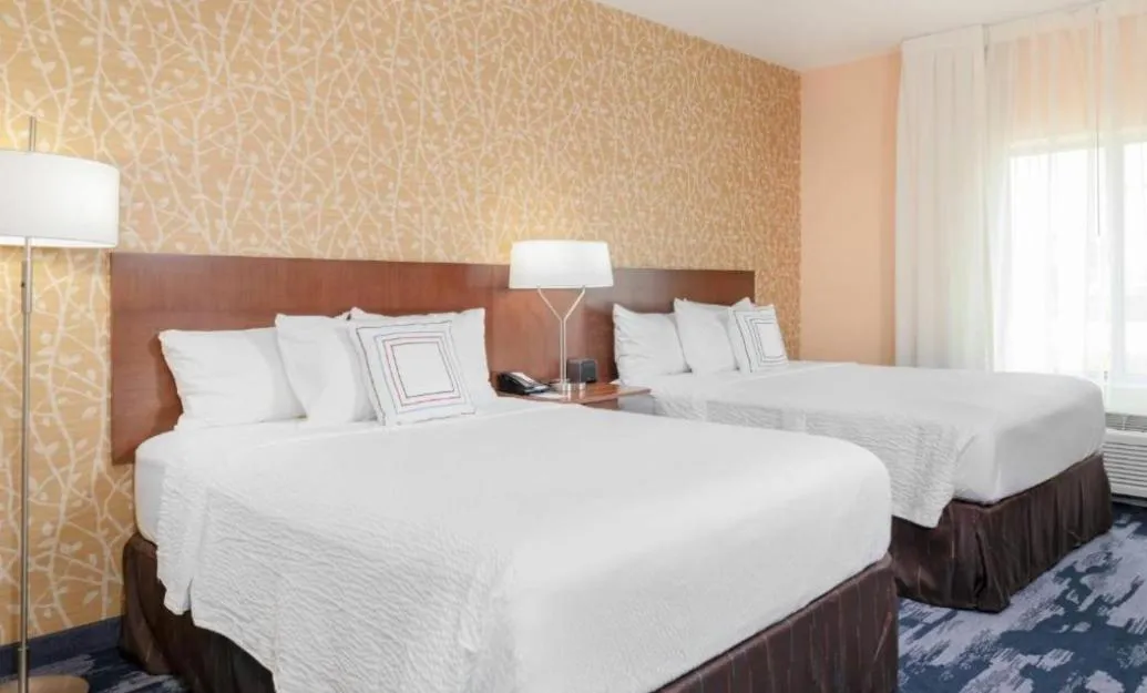 Bed in Fairfield Inn & Suites by Marriott Augusta Washington Rd./I-20
