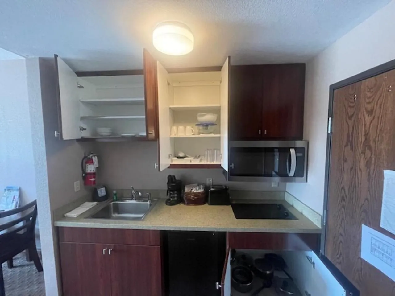 Kitchen or kitchenette in Bell's Extended Stay and Suites
