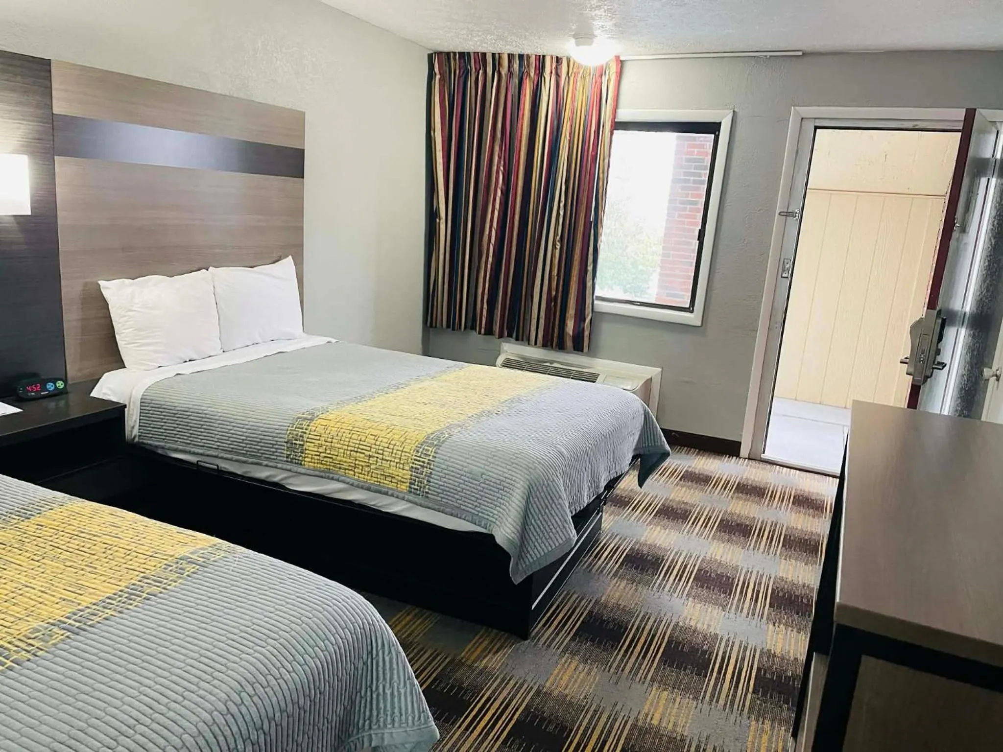 Bed in Travelodge by Wyndham Sellersburg