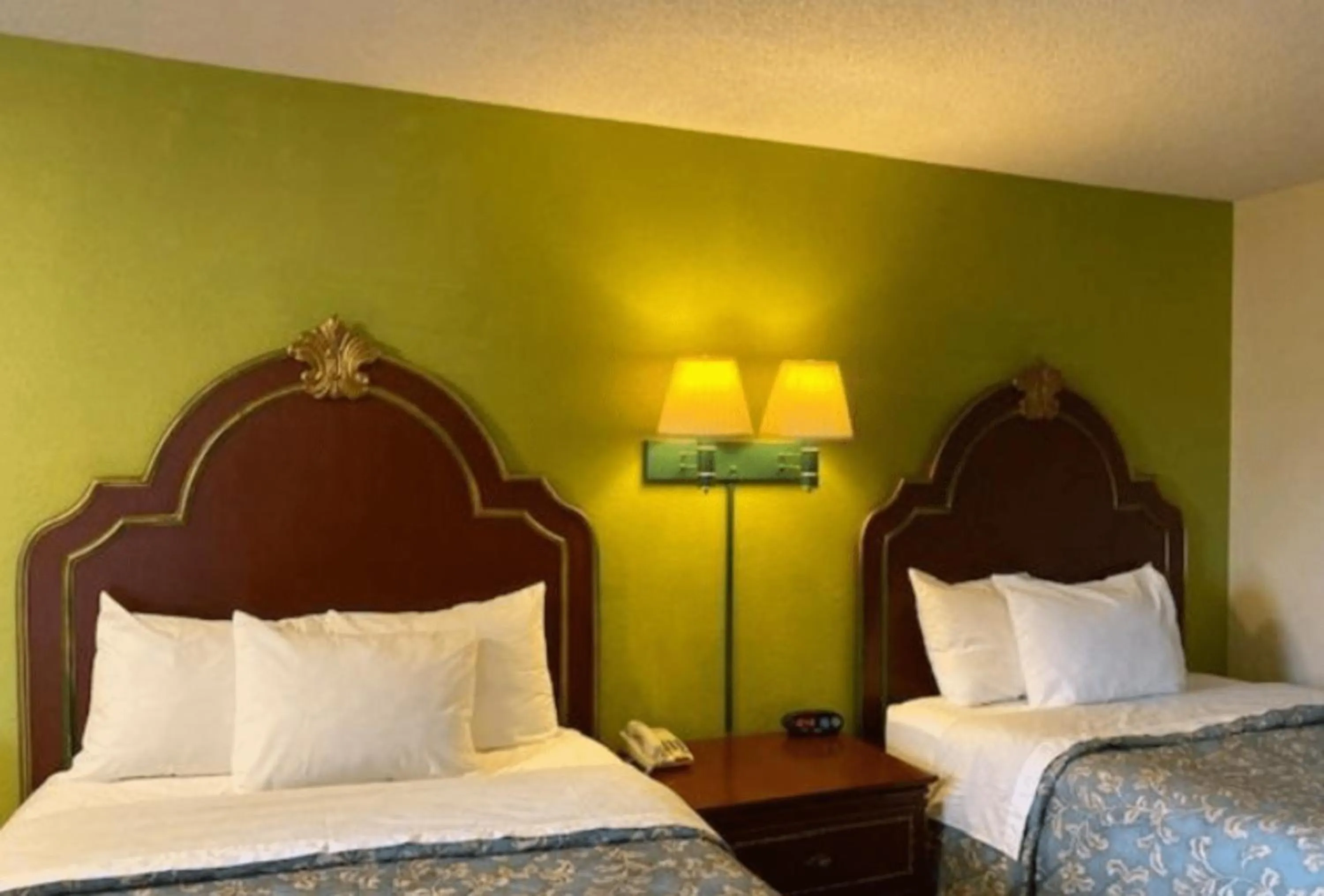 Bed in Travelodge by Wyndham Sellersburg