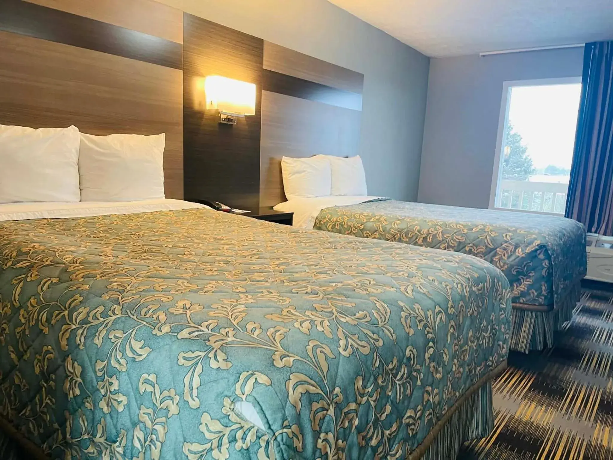 Deluxe Double Room with Two Double Beds - Non-Smoking in Travelodge by Wyndham Sellersburg Deluxe Double Room with Two Double Beds - Non-Smoking in Travelodge by Wyndham Sellersburg