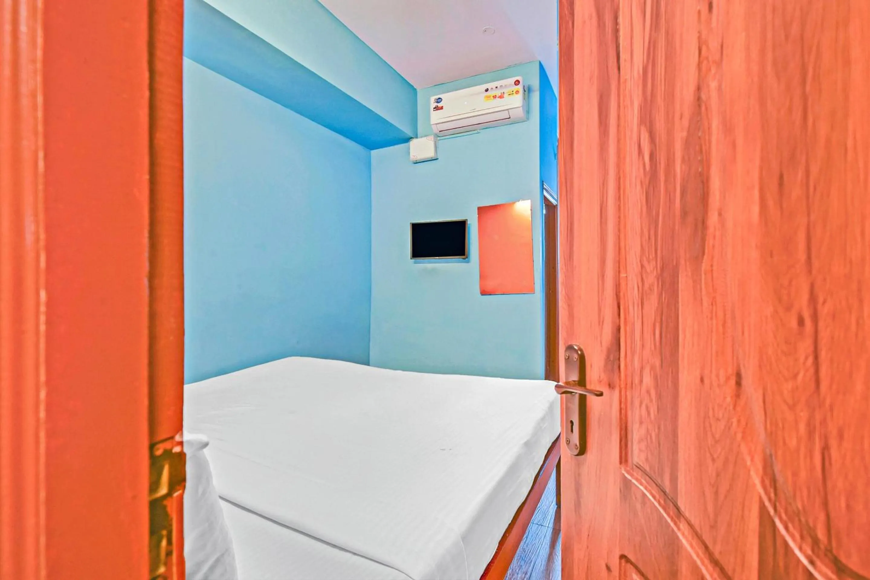 Bedroom, Bed in Hotel O Sri Sai Guru Comforts