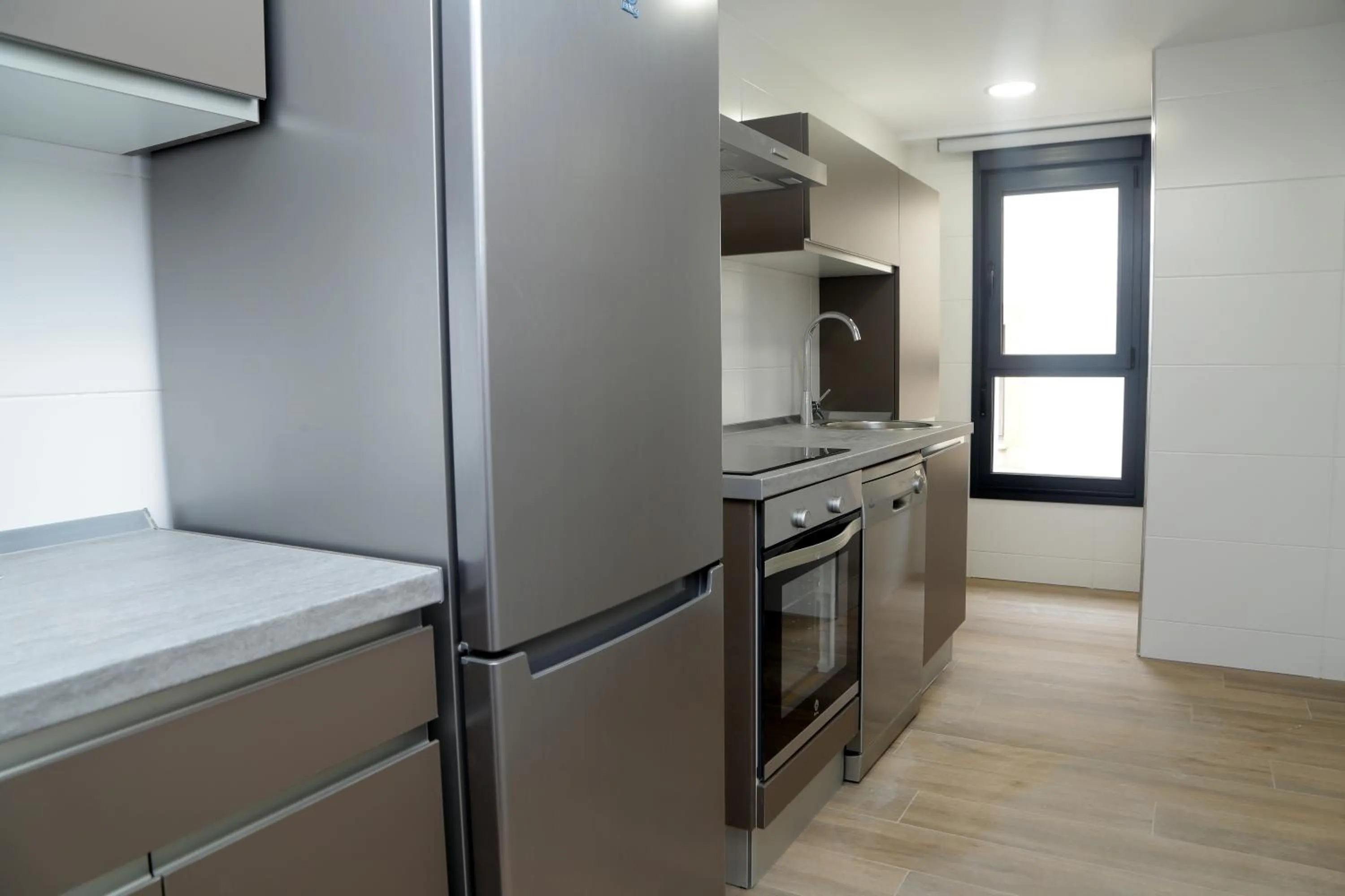 Kitchen or kitchenette in Viviendas Oviedo Catedral