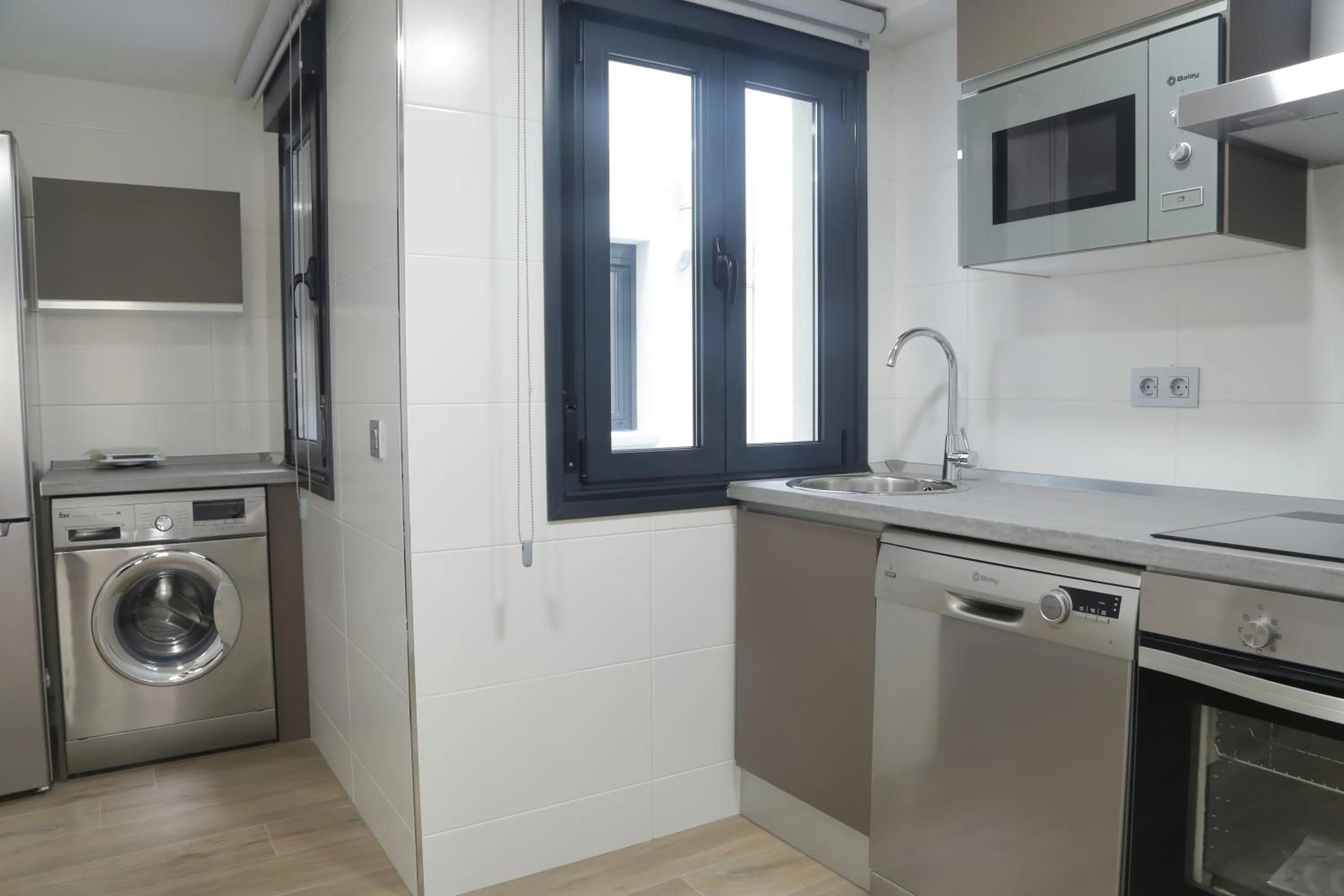 Kitchen or kitchenette in Viviendas Oviedo Catedral