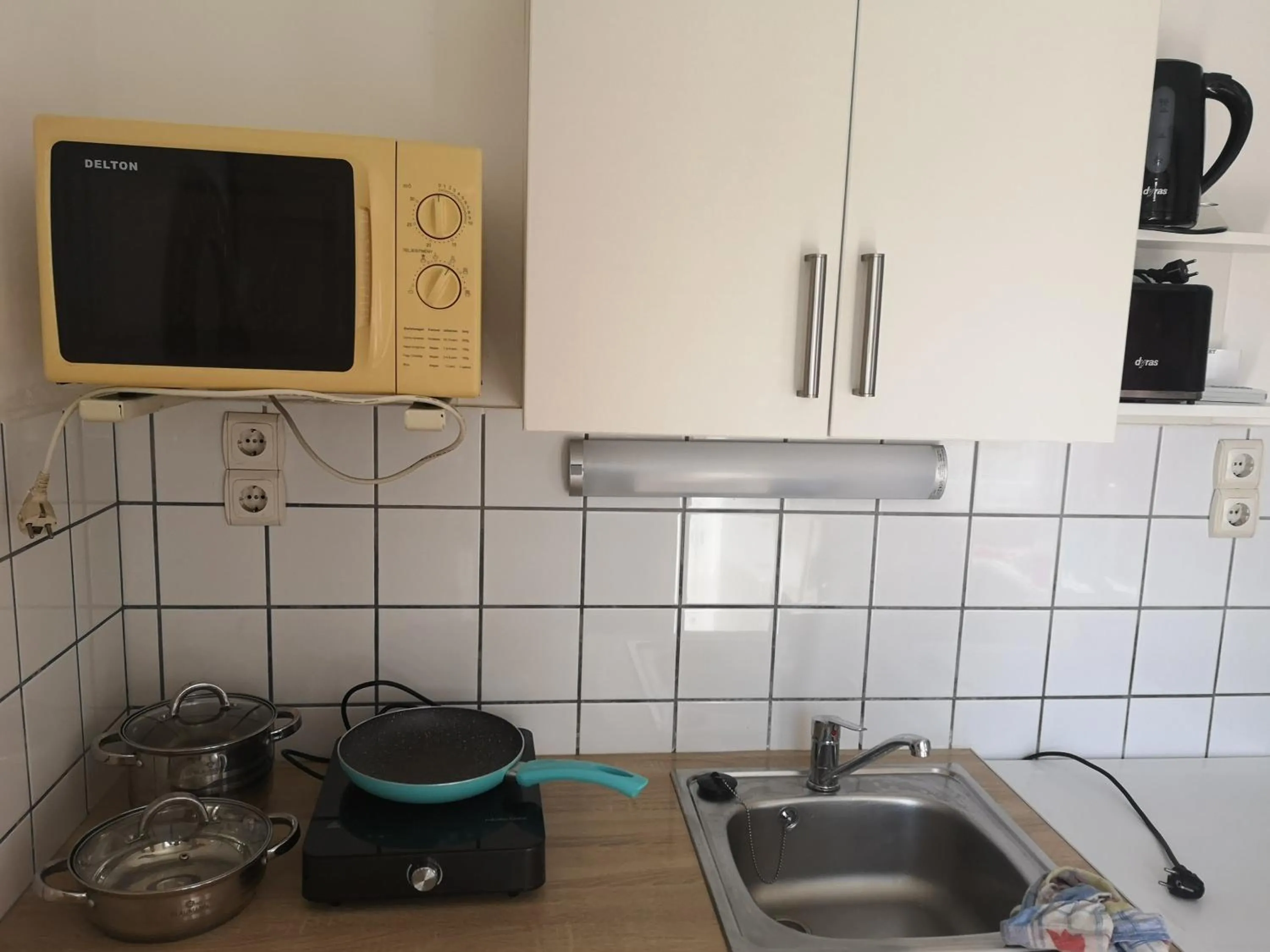 Kitchen or kitchenette in Apartman Kaszás Garden
