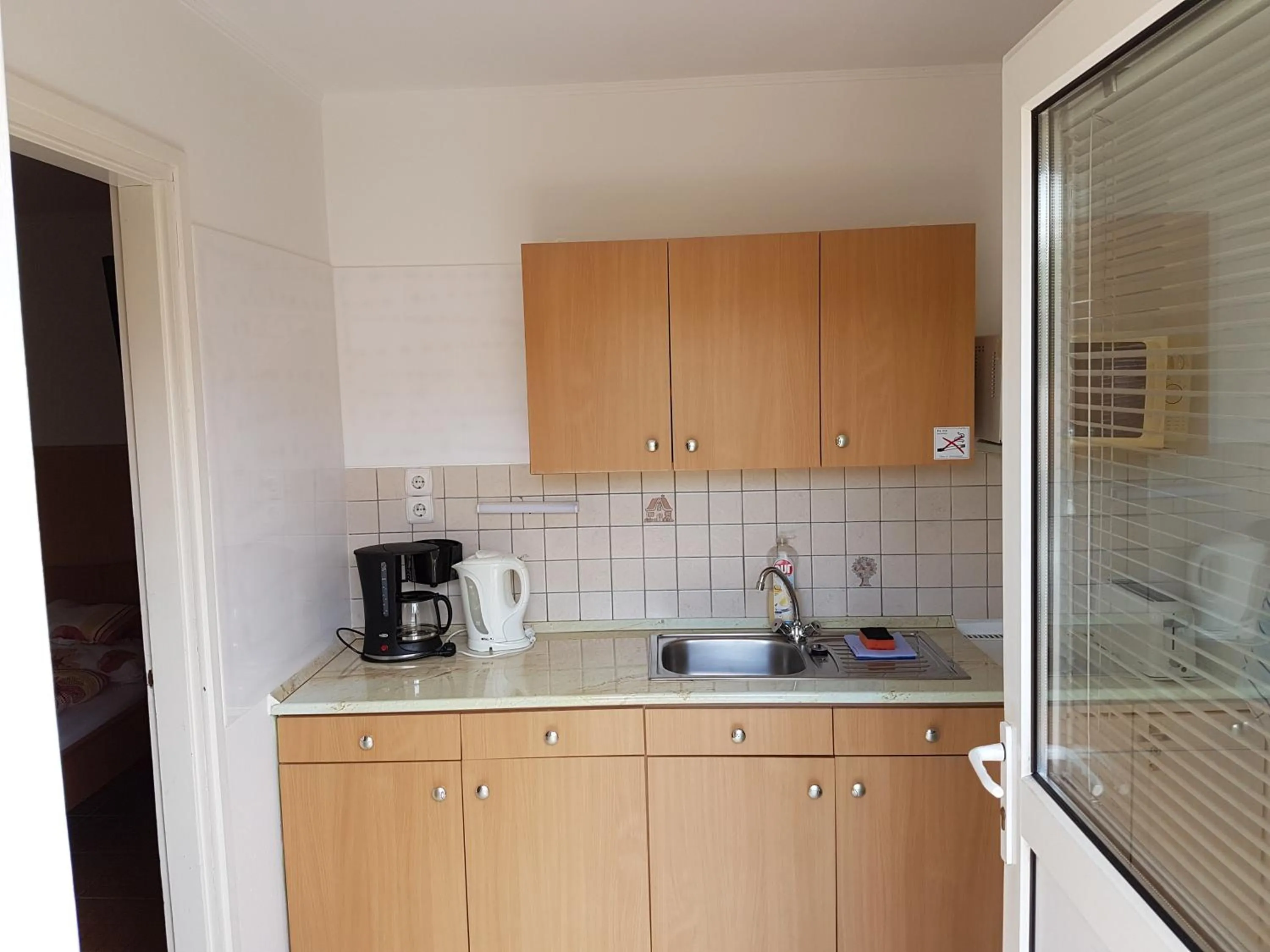 Coffee/tea facilities in Apartman Kaszás Garden