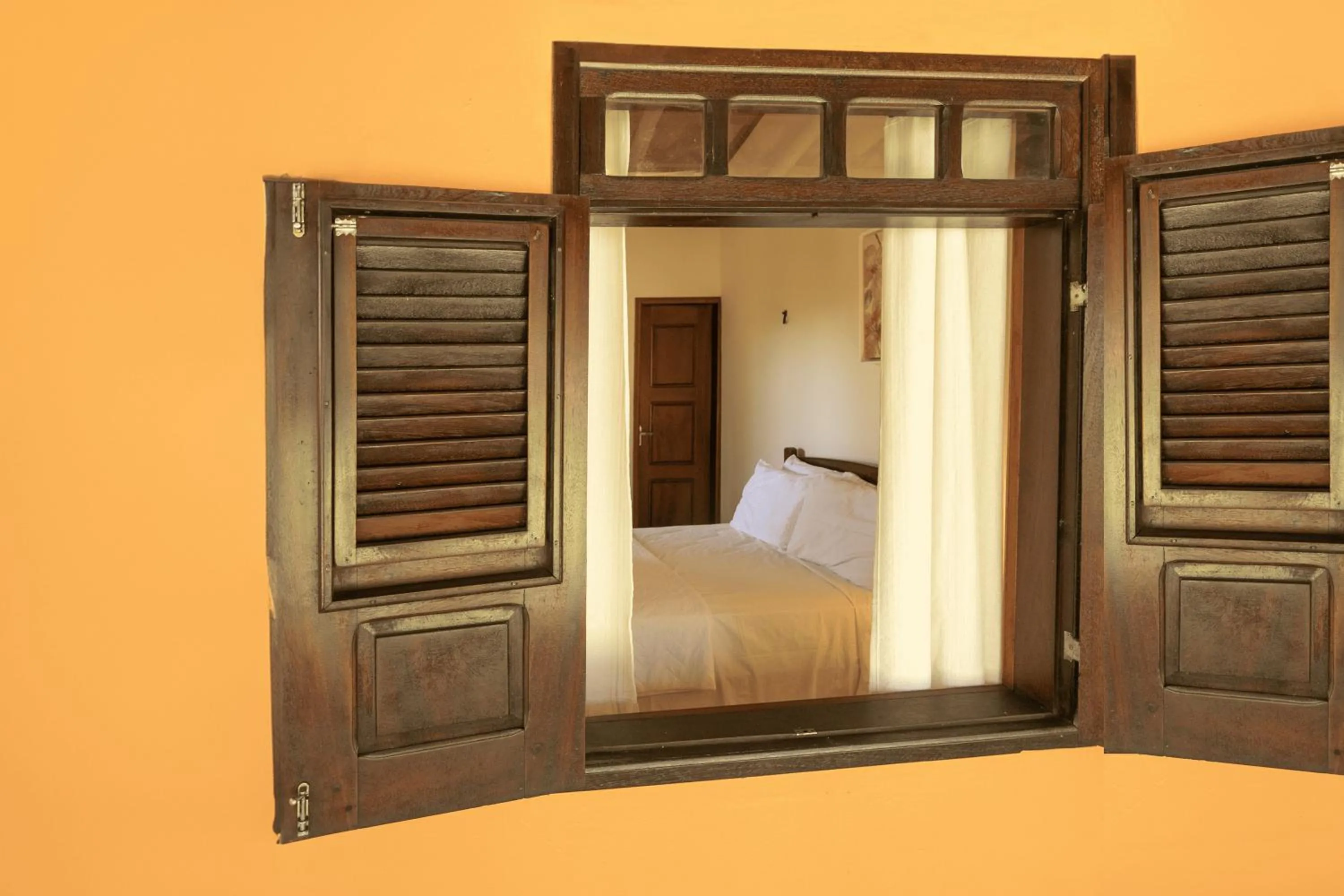 Photo of the whole room, Bed in Casa Manoel Facão