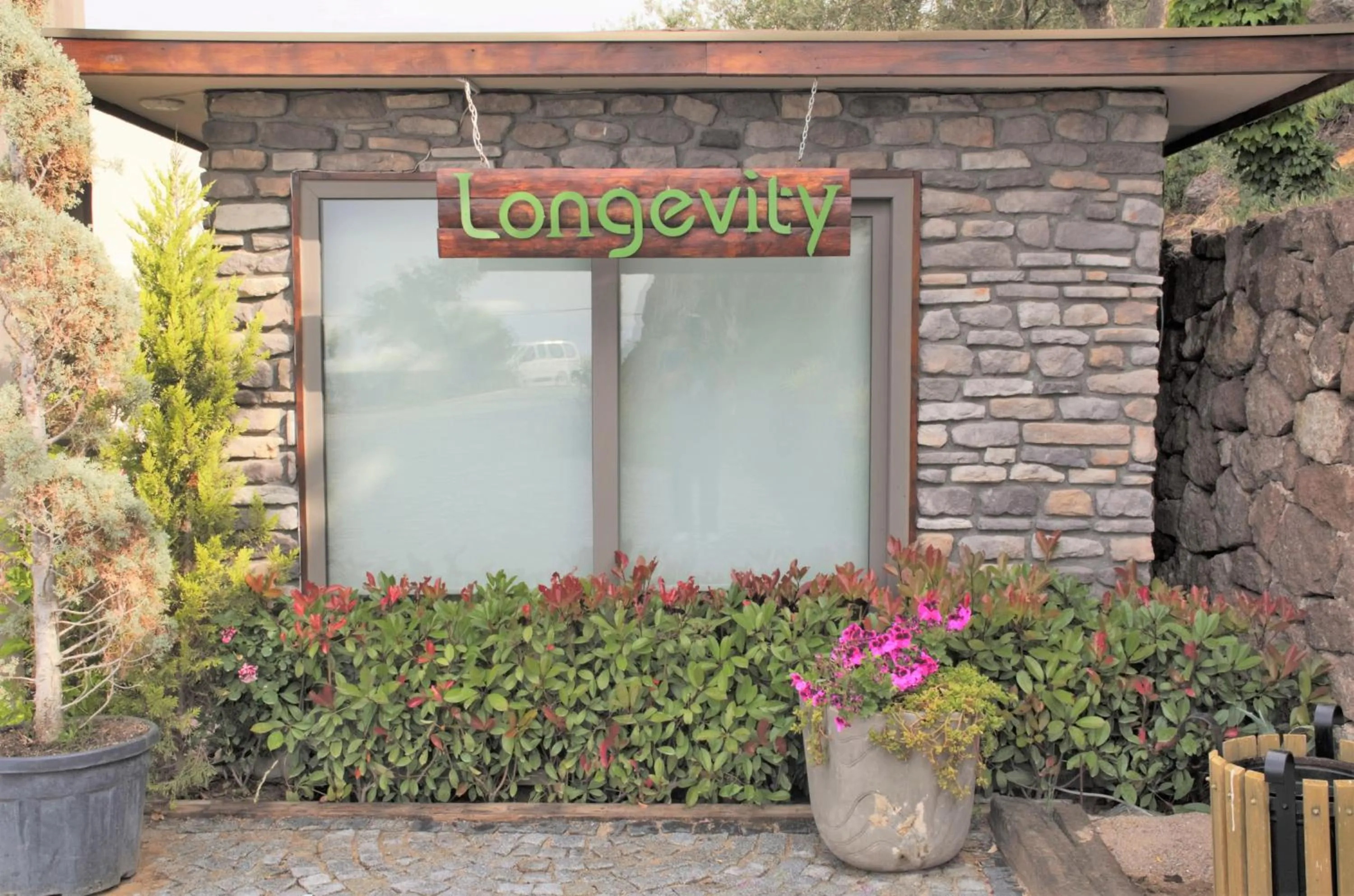 Logo/Certificate/Sign in Assos Longevity Hotel