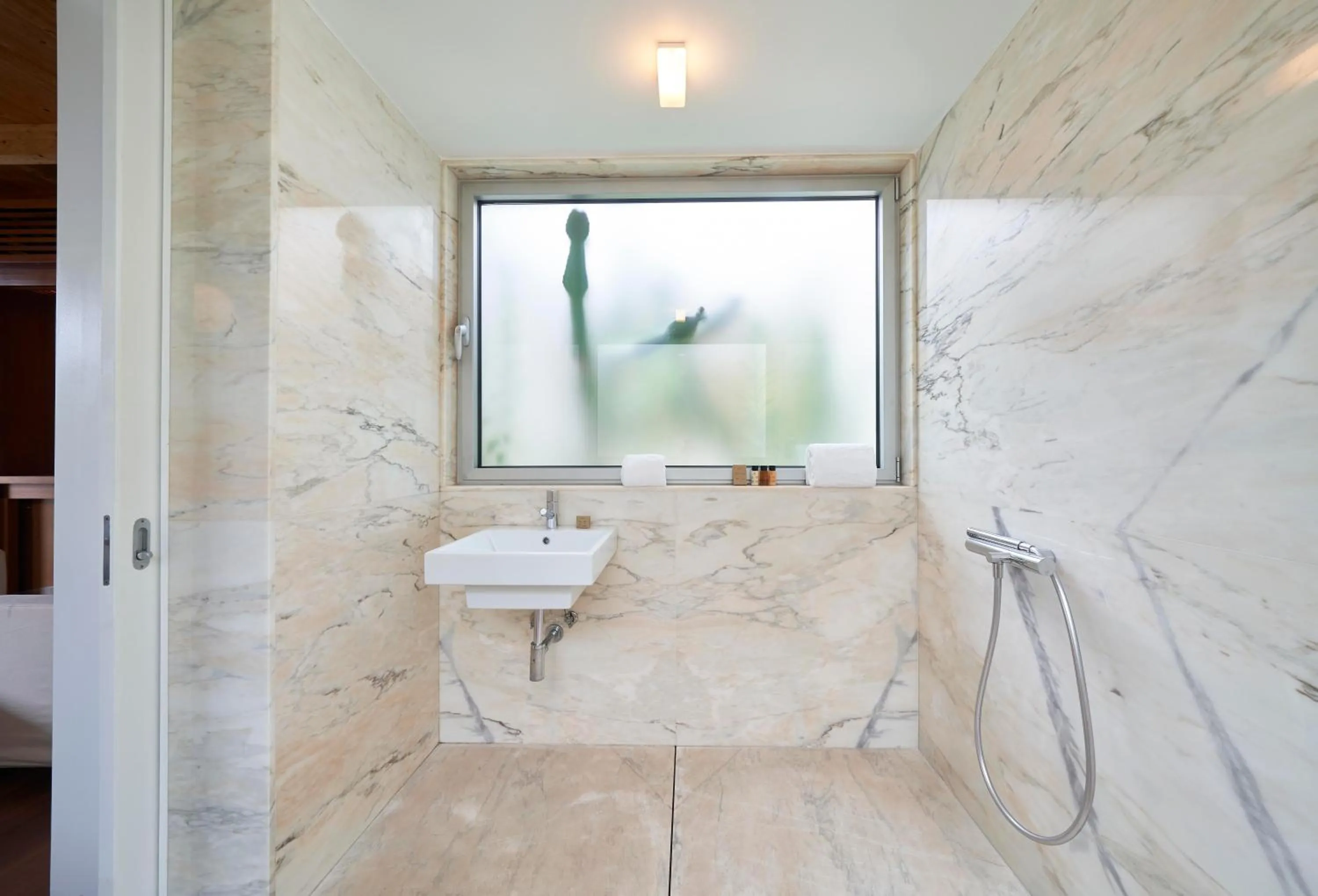 Bathroom in Hotel Porto Santo & Spa