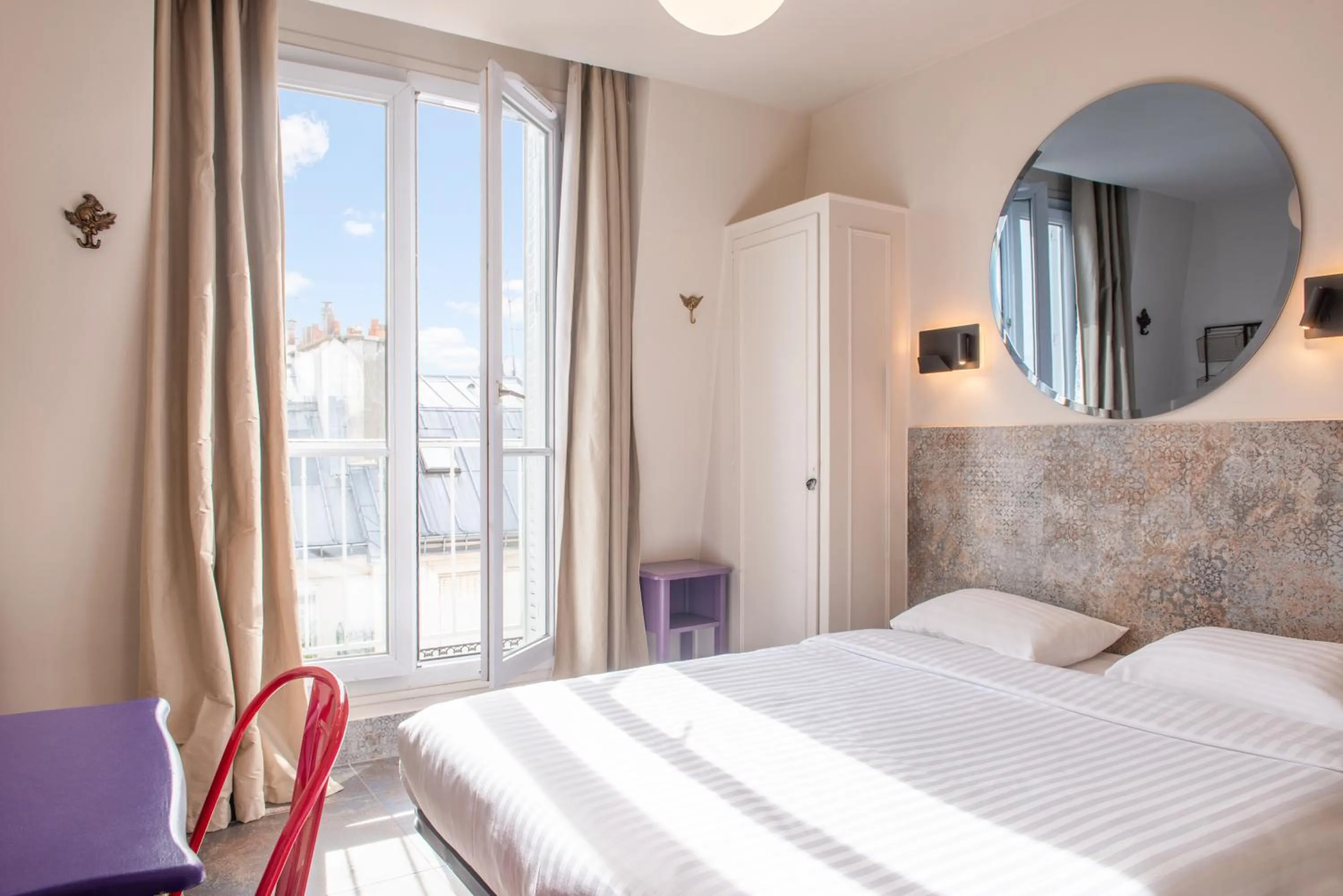 Bed in Hôtel de Roubaix