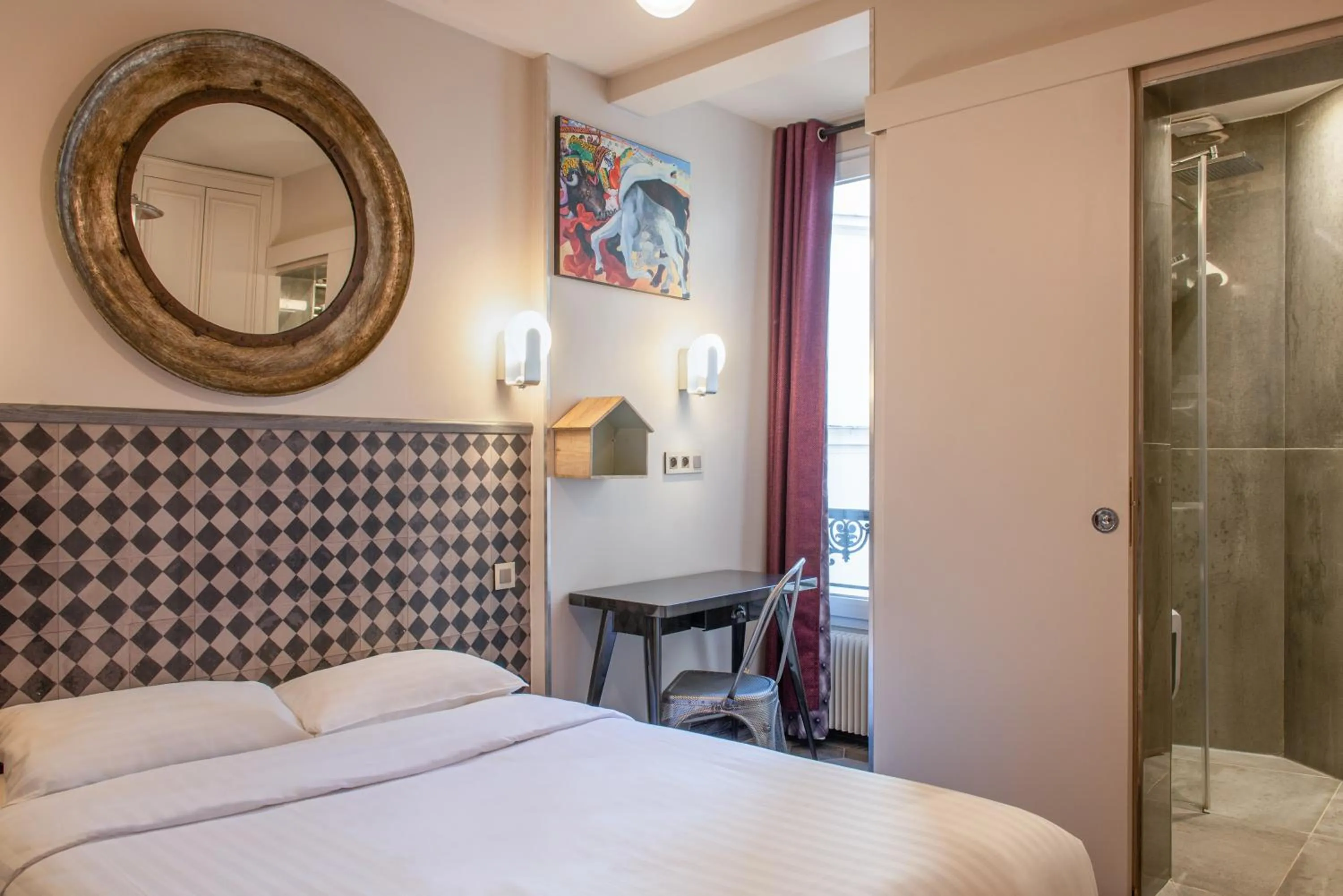 Bed in Hôtel de Roubaix