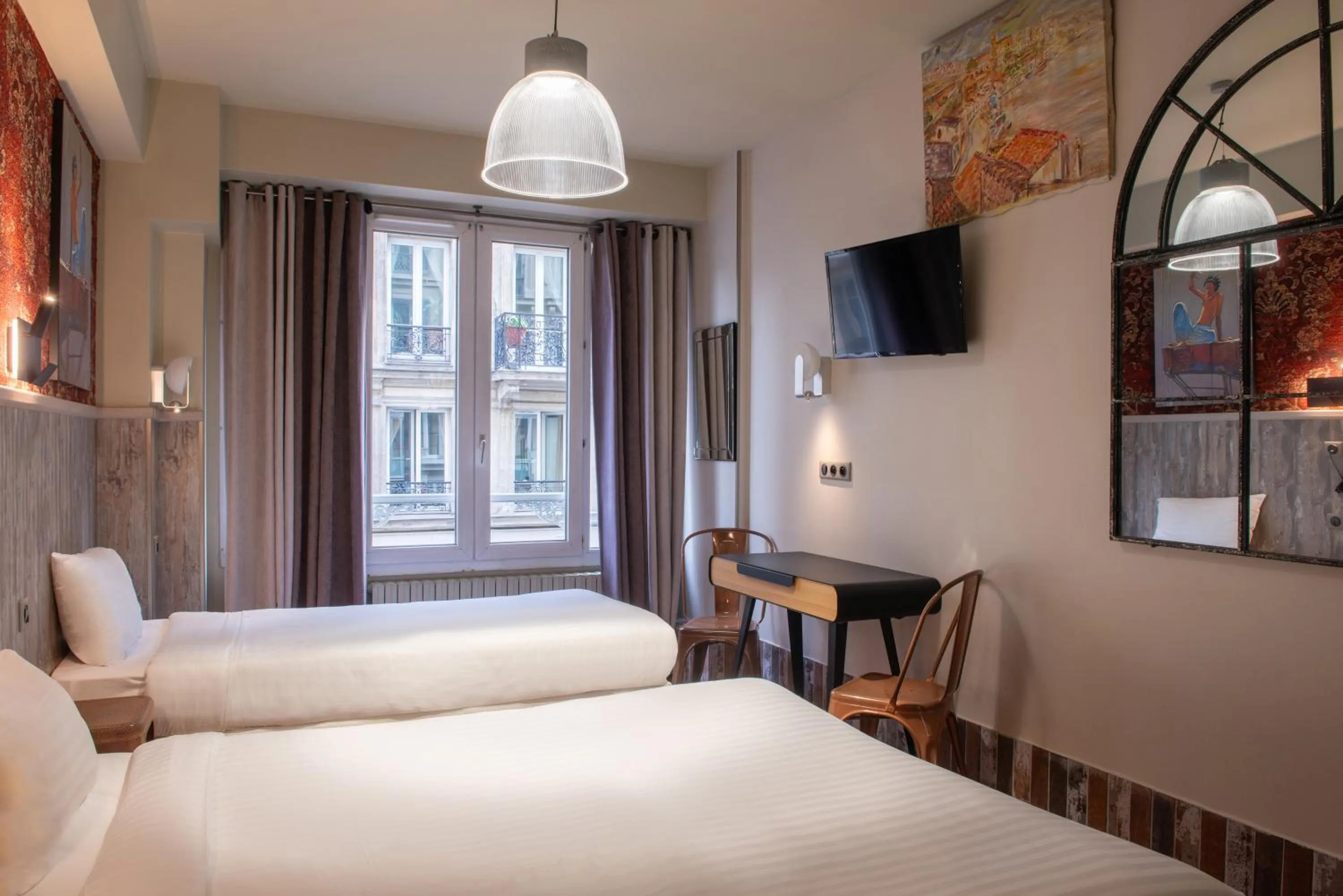 Bed in Hôtel de Roubaix