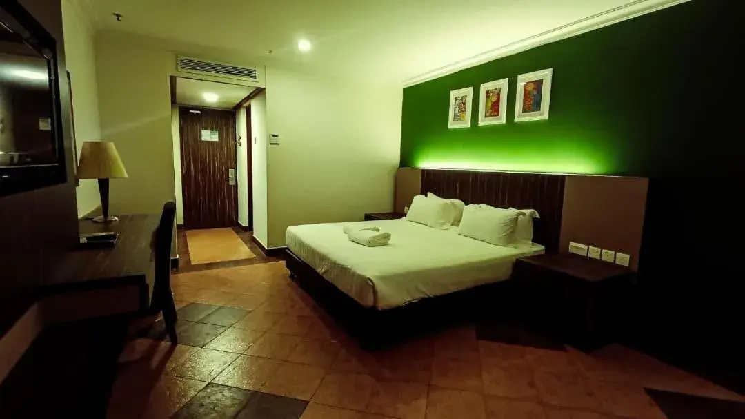 Bed in De Rhu Beach Resort Bed in De Rhu Beach Resort